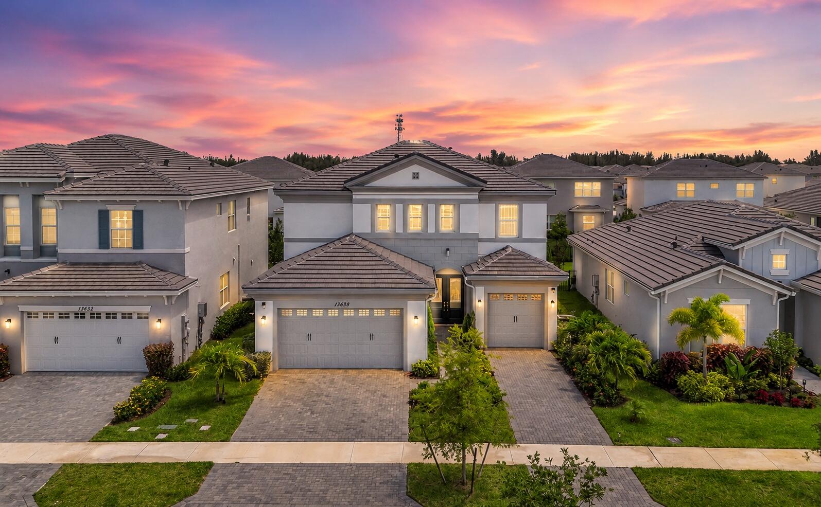 Welcome to this beautiful 2025 built modern two-story home in Westlake, FL, offering 3 bedrooms, 2.5 baths, loft, and a bright, open layout. Inside, you'll find gorgeous tile flooring, stainless steel appliances, and a cozy fireplace that. The covered patio opens to a spacious backyard, creating the perfect setting to relax, entertain, or enjoy time outdoors. A three-car garage provides excellent storage and everyday convenience. Located in a vibrant Westlake community with incredible amenities, including an adventure park, resort-style pool, fitness center, and more, this home is near great schools, offering a wonderful blend of comfort, convenience, and neighborhood lifestyle.