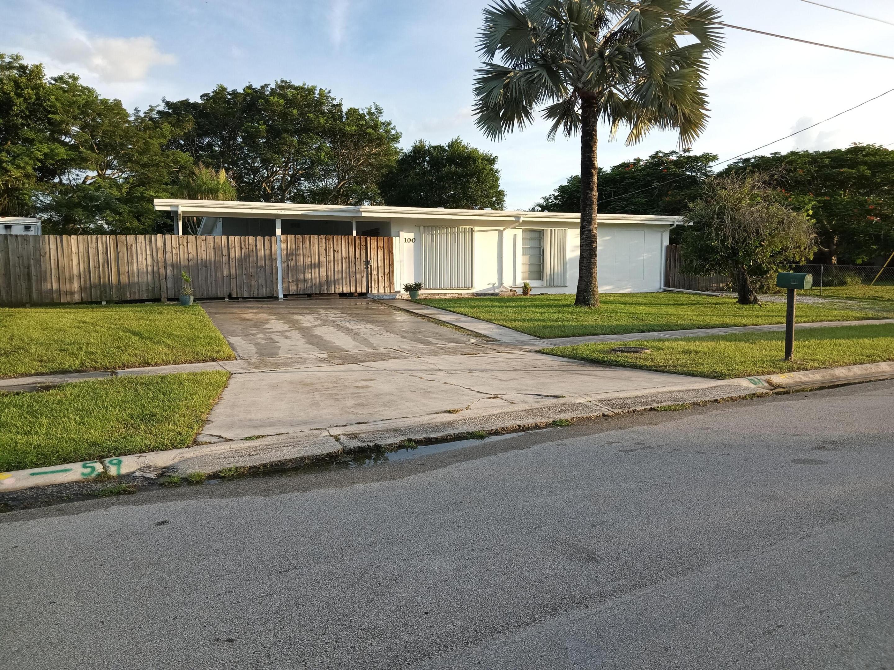 This charming property offers privacy, space, and immediate availability. 

Built in 1961, this durable concrete block home features vaulted ceilings, a poly-coated roof, stainless steel appliances, remodeled bathrooms, and new tile flooring.

Set on a fenced lot with room for a pool and a 60x40 building, it backs onto county easement with trail excellent for outdoor adventures. Lush landscaping includes shade hammock of oak, earpod, bismark palm, ponytail palm, bougainvila, an aloe/cactus garden, with serene forest views from an 28x18 patio.

Highlights include a master suite with a private entrance/kitchenette, an air-conditioned workshop, hurricane shutters, and a 10kW generator. The seller will install a new HVAC system with signed PA/NRD.