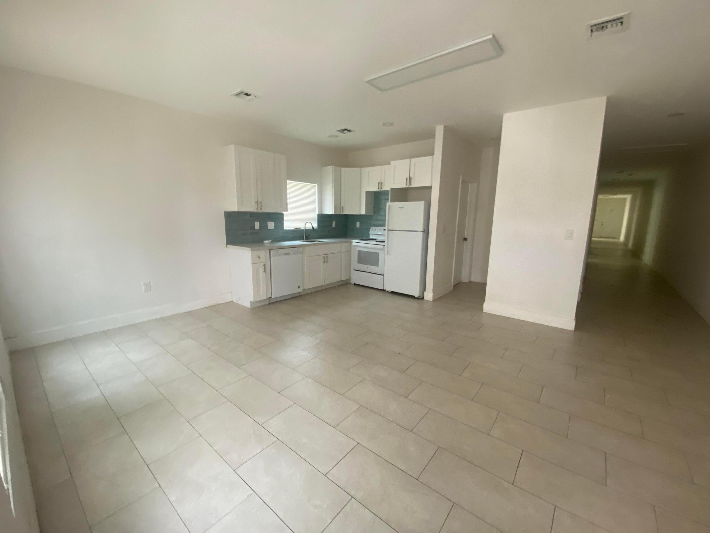 Welcome to this spacious six-bedroom, three-bathroom single-family residence located in North West Lauderdale, Fort Lauderdale. With 2,010 square feet of finished living space on one story, this home offers abundant room and convenient single-level living. The thoughtful layout provides flexibility for various uses, whether for housing guests, creating dedicated work areas, or accommodating multiple generations under one roof. This property presents a solid foundation for those seeking substantial space and practical functionality in the Fort Lauderdale area.