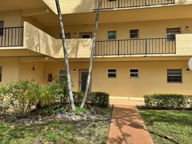 Price reduced for a quick sale! Beautifully maintained 1BR / 1.5BA first floor unit in the desirable 55+ Carriage Hills community. This bright and spacious home features tiled flooring throughout and is in excellent condition. Enjoy a peaceful screened in patio with a lovely view of the community greens.  Unit is offered fully furnished exactly as shown in the photos, providing a true move in ready opportunity. The seller will pay the upcoming 40 year recertification assessment (estimated $17,000-$21,000), delivering exceptional value to the buyer.  Assigned parking is right at your door, with plenty of guest parking available. Community amenities include multiple pools, jacuzzi, sauna, gym, billiards, walking/bike trails, and a lakeside clubhouse. 650 minimum credit score required.