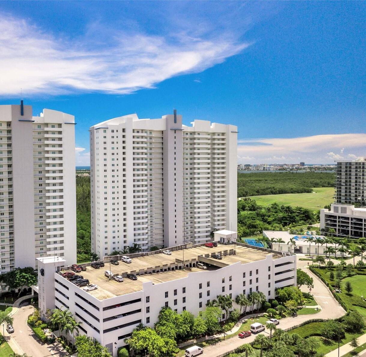 Spacious 2-bedroom, 2.5-bath unit with private, serene views. Features marble floors and a gourmet kitchen with granite countertops and top-of-the-line GE stainless steel appliances. The primary bathroom includes a Jacuzzi tub and walk-in closets. Enjoy brand-new amenities including an infinity pool, tennis court, children's play area, 24-hour security, and a fully equipped gym. Conveniently located within walking distance to restaurants and Publix, just steps from middle and elementary schools and FIU campus, and only 1.5 miles from Sunny Isles Beach. Includes cable and internet.