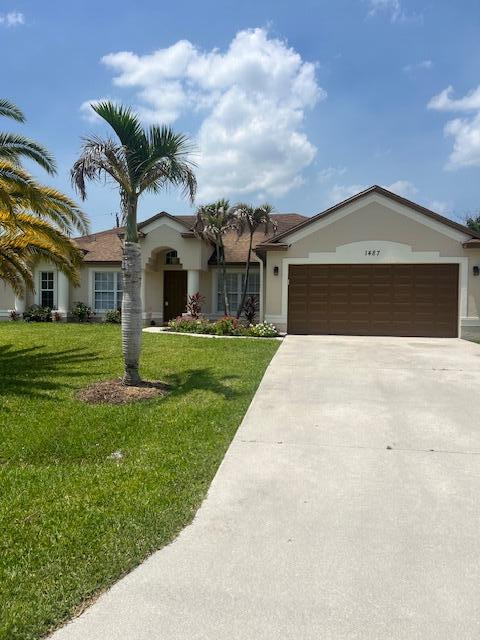Welcome to this single-story residence in Port St. Lucie Section 12, offering 1,986 square feet of thoughtfully designed living space. This three-bedroom, two-bathroom home provides comfortable accommodations for various living arrangements and lifestyle needs. The open layout maximizes functionality across the home, while the two-car garage offers convenient covered parking and storage solutions. Situated in Port St. Lucie, this property delivers straightforward appeal and practical everyday living.