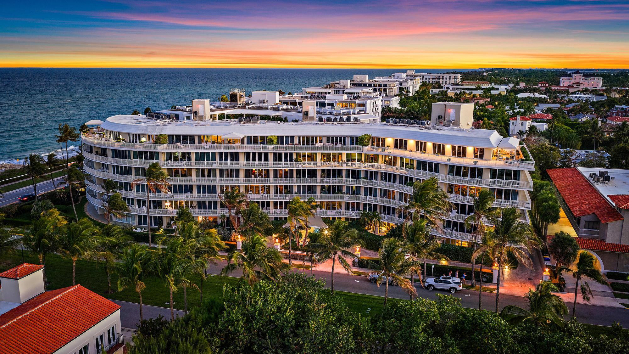 Experience refined Palm Beach living in this beautifully appointed residence at 100 Royal Palm Way, an iconic Howard Chilton Art Moderne, ocean front boutique building. With tropical views and a generous, well-designed layout, this three-bedroom, three-bath condominium, with over 3000 total square feet, offers an inviting blend of comfort, style, and coastal sophistication. The spacious living room and semi-formal dining area create an ideal setting for both everyday living and entertaining, while the eat-in kitchen--with its convenient service entrance--adds practicality and ease. Wood flooring enhances the main living spaces, and each bedroom features an en-suite bath, and ample closet space. A large balcony extends the living area outdoors, providing the perfect spot to enjoy the ocean breeze and morning light. Set within a prestigious doorman building, residents enjoy exceptional amenities including garage parking, a pool, a fitness center, and the support of a full-time on-site manager. Perfectly positioned across from the beach and just moments from world-class shopping, dining, and the scenic Lake Trail, this residence offers an unparalleled combination of luxury, convenience, and Palm Beach lifestyle.