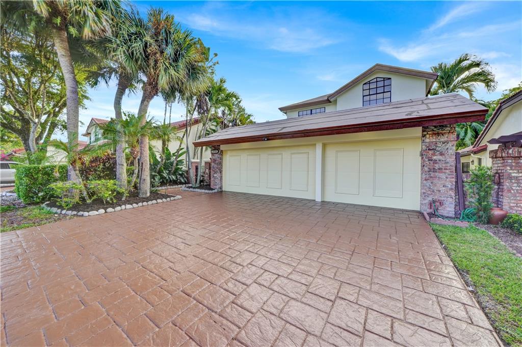 Beautifully presented Single Family Home in a gated Central Boca Raton Community.  This home has many features including; New Roof (tiles on back order) with 7 year warranty, Shaker White Kitchen Cabinetry, Quartzite Counter-tops, modern backsplash, Stainless Steel Appliances with 12 month warranty, waterproof vinyl flooring throughout, oversized 3 Car Garage, modernly designed bathrooms, Dual Zone AC's, community pool, central vac, and a private backyard with garden views.  Location is second to none; close to high-end retail shops, fine dining, major highways, and some of the best public schools around. Roof tiles are ordered, they are back ordered due to supply chain issues.  Delivery expected end of October early November.
