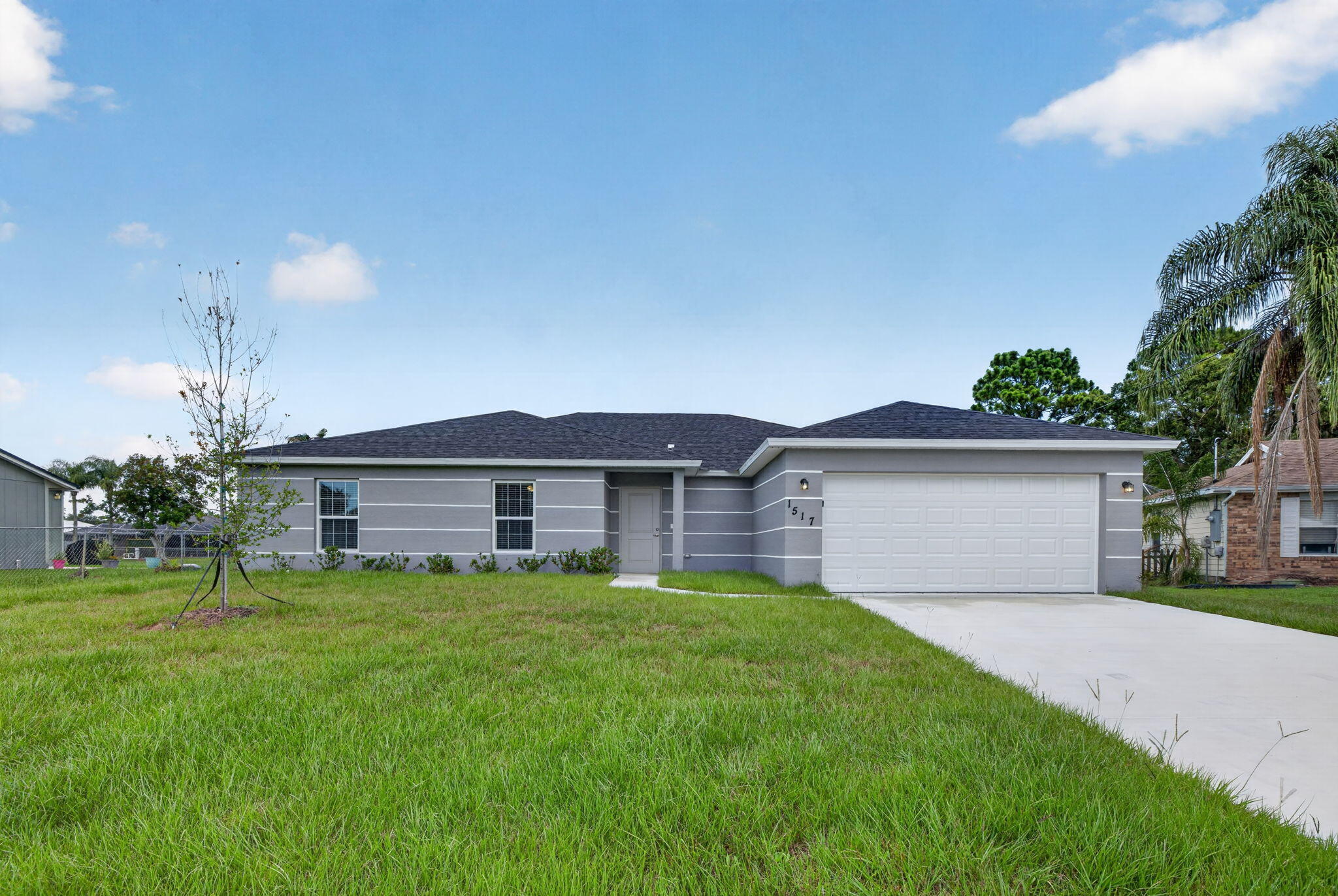 PRICE REDUCTION!! CLOSING COSTS AVAILABLE!! Verona I offers easy Florida living with a smart 4BR/2BA split floor plan, LPV thru-out, 2-car garage, and 1,915 sq ft of living space (2,547 total sq ft). The open-concept kitchen and great room create a natural hub for everyday life and entertaining, opening directly to a covered back patio overlooking a serene canal view—ideal for morning coffee, family dinners, and weekend gatherings. The fully fenced yard adds privacy and room to roam. A semi-private dining area sits just off the kitchen for effortless hosting. The primary suite is set apart from three guest bedrooms. Baths feature raised wood vanities, solid-surface counters, Moen fixtures, and water-saving commodes. The kitchen includes wood cabinetry,