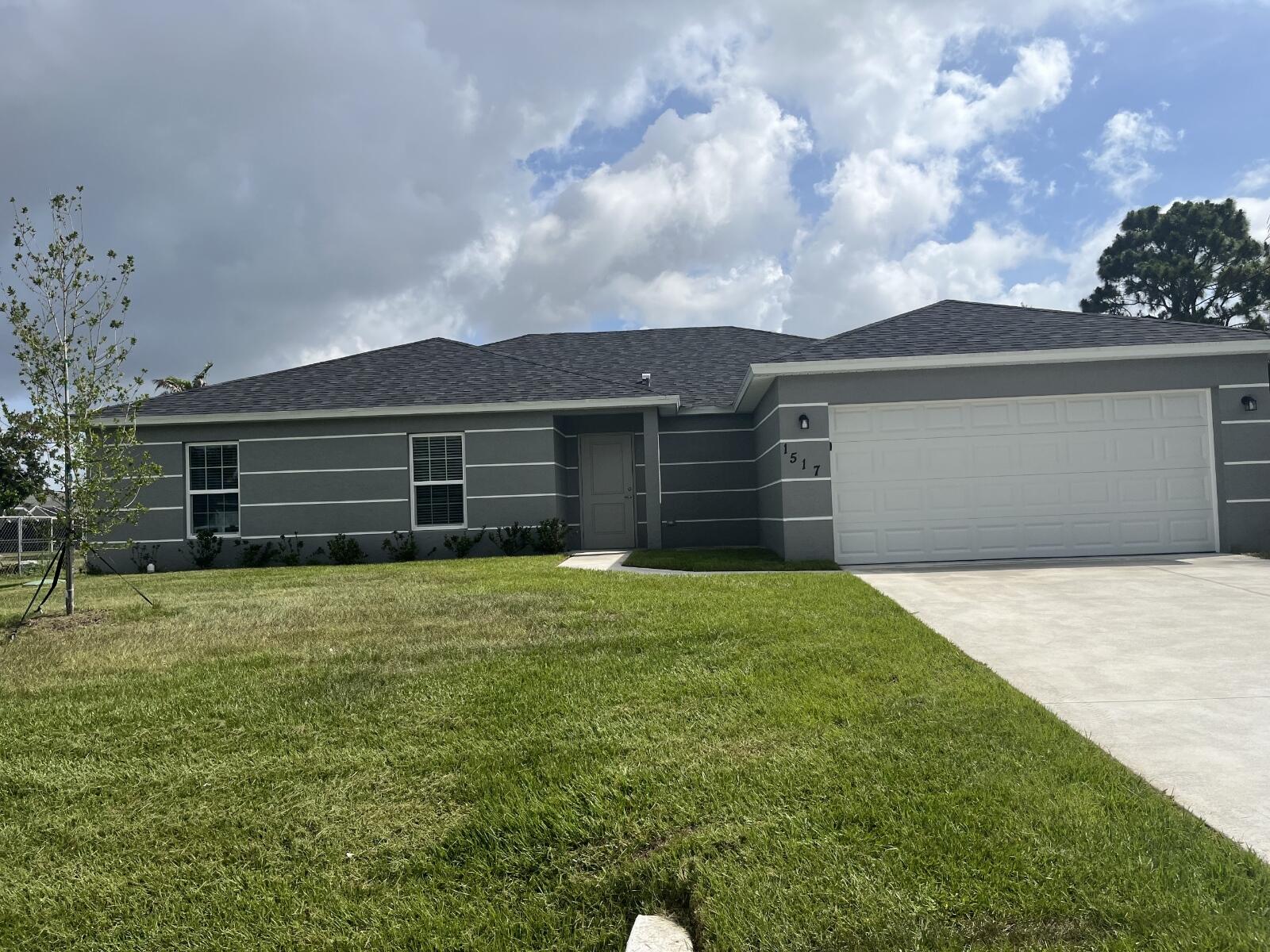 PRICE REDUCTION!! CLOSING COSTS AVAILABLE!! Verona I offers easy Florida living with a smart 4BR/2BA split floor plan, LPV thru-out, 2-car garage, and 1,915 sq ft of living space (2,547 total sq ft). The open-concept kitchen and great room create a natural hub for everyday life and entertaining, opening directly to a covered back patio overlooking a serene canal view—ideal for morning coffee, family dinners, and weekend gatherings. The fully fenced yard adds privacy and room to roam. A semi-private dining area sits just off the kitchen for effortless hosting. The primary suite is set apart from three guest bedrooms. Baths feature raised wood vanities, solid-surface counters, Moen fixtures, and water-saving commodes. The kitchen includes wood cabinetry,