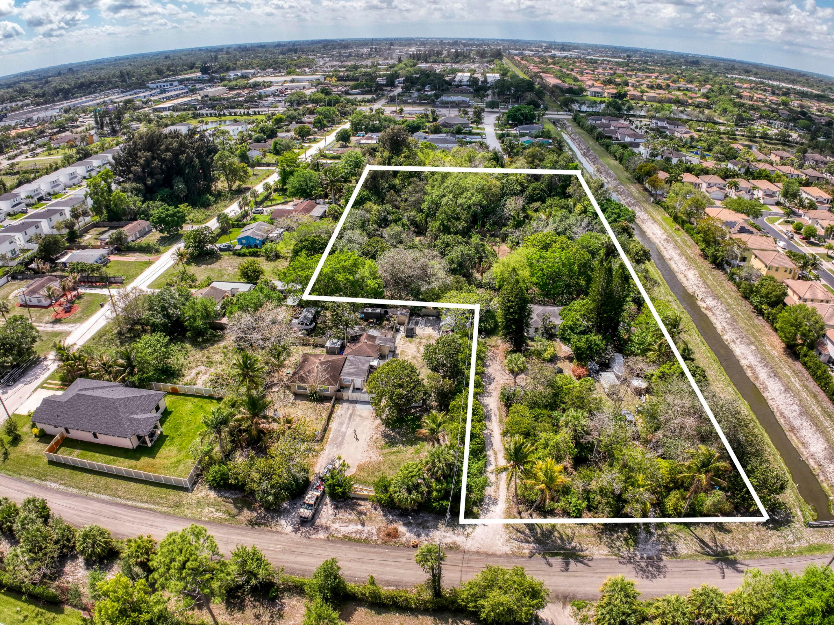 Excellent opportunity to acquire two adjoining parcels in a highly desirable West Palm Beach location. Parcel IDs 00424327050050610 and 00424327050050611 are listed separately; however, both parcels are being sold together as a package and will not be sold individually. Combined, the properties offer just over 4 acres, creating an exceptional opportunity for investors, builders, and developers seeking a larger tract for future development, investment, or land banking. Please note that the advertised listing price reflects the individual parcel only and does not represent the purchase price for both parcels combined. Don't miss this unique offering with outstanding growth and development potential.