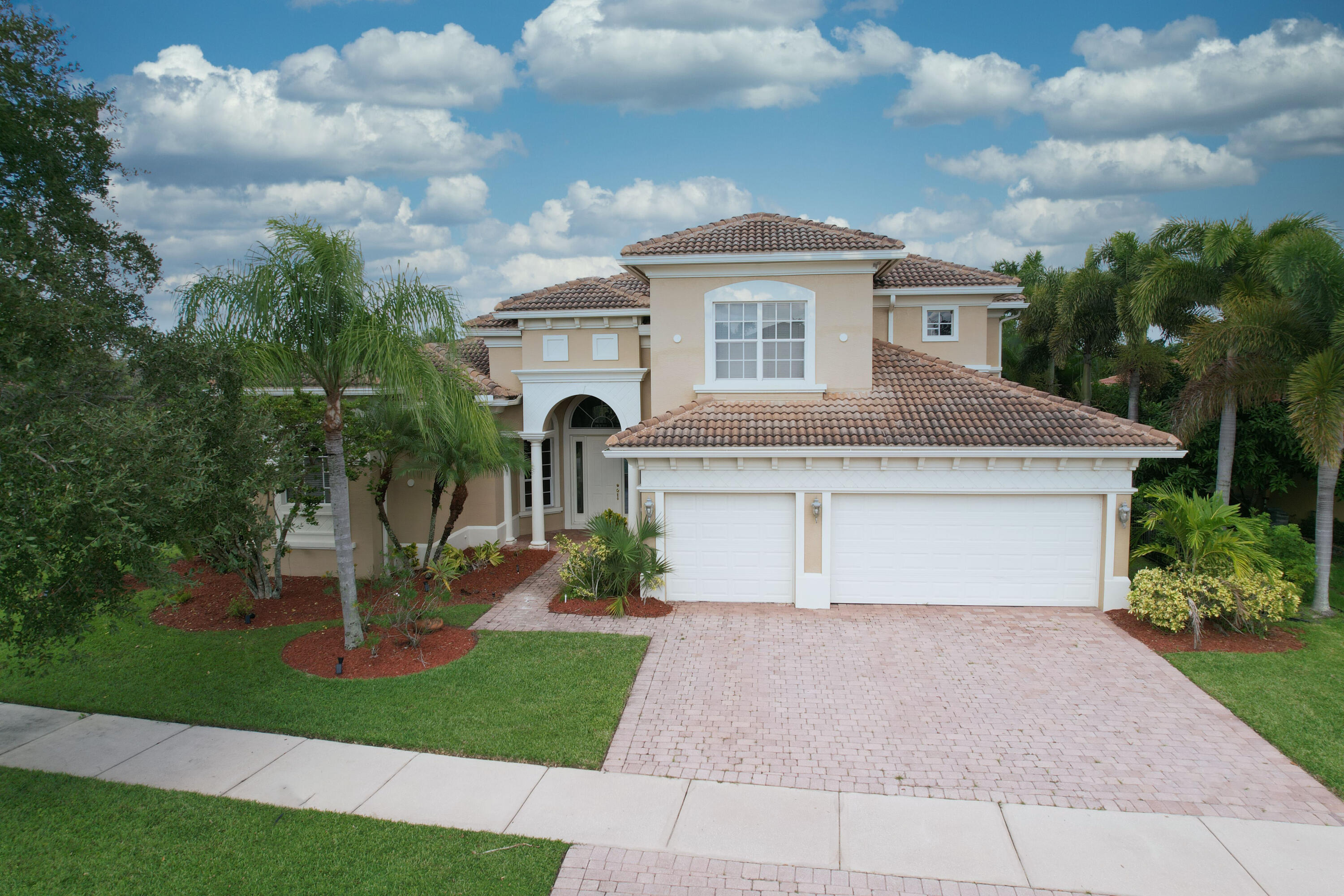 Plenty of room to roam! If you are looking for a beautiful spacious pool home with lots of bedrooms, and lots of bathrooms, we have found the perfect place for you, within an upscale gated community at Tradition. The primary bedroom suite on the ground floor has spacious his and her walk in closets. Two more bedrooms, and two more baths are also on the ground floor. The upstairs contains two bedrooms, and two more baths (one a mini suite). Also included is an office/den. The large patio area adjoining the pool is also plumbed for an outdoor kitchen. Lots of Storage! Seller will entertain negotiation in which the prospective buyer may enter into a lease, for the subject property.