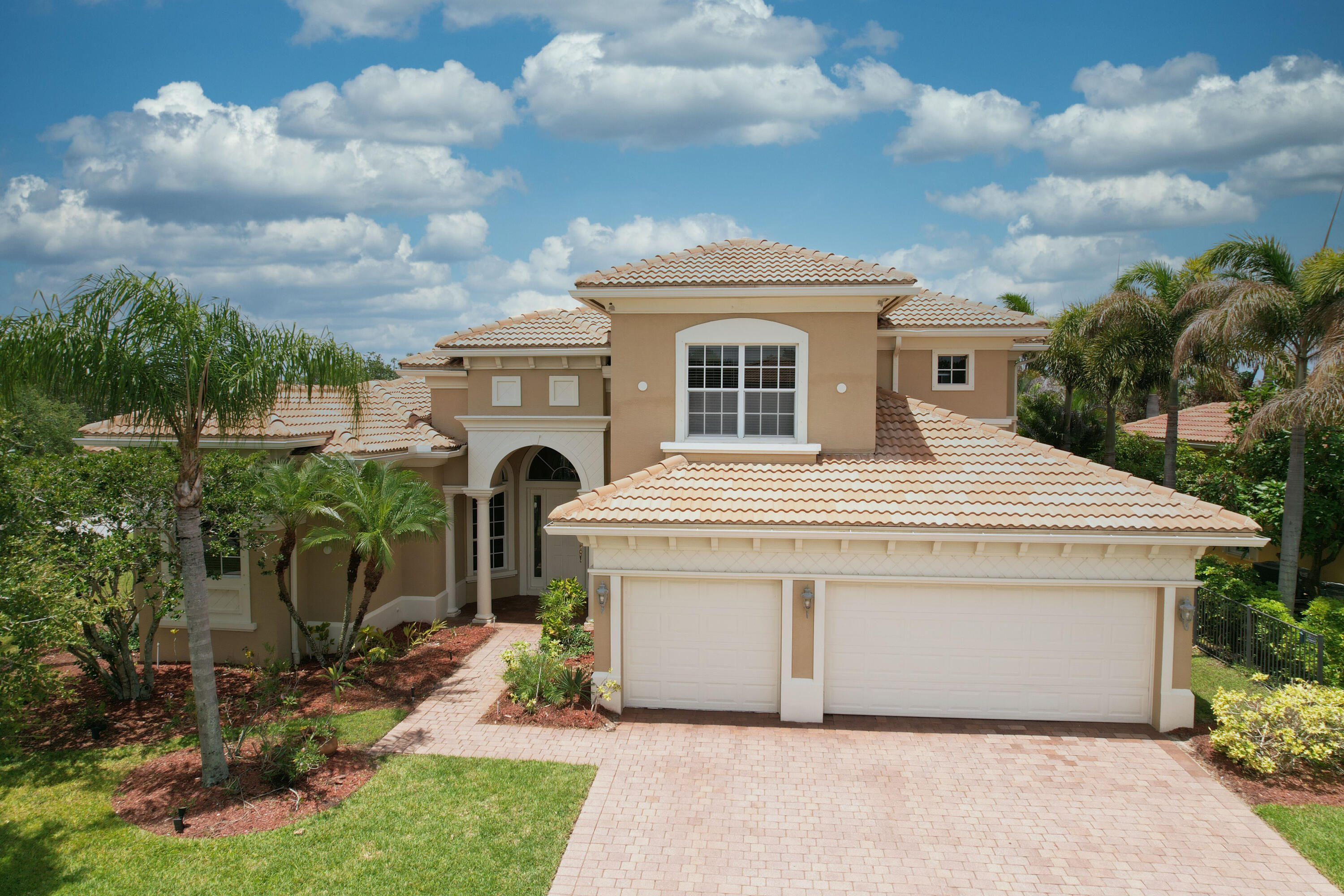 Plenty of room to roam! If you are looking for a beautiful spacious pool home with lots of bedrooms, and lots of bathrooms, we have found the perfect place for you, within an upscale gated community at Tradition. The primary bedroom suite on the ground floor has spacious his and her walk in closets. Two more bedrooms, and two more baths are also on the ground floor. The upstairs contains two bedrooms, and two more baths (one a mini suite). Also included is an office/den. The large patio area adjoining the pool is also plumbed for an outdoor kitchen. Lots of Storage! Seller will entertain negotiation in which the prospective buyer may enter into a lease, for the subject property.  Roof cleaned June 2026; Driveway cleaned and sealed June 2026.