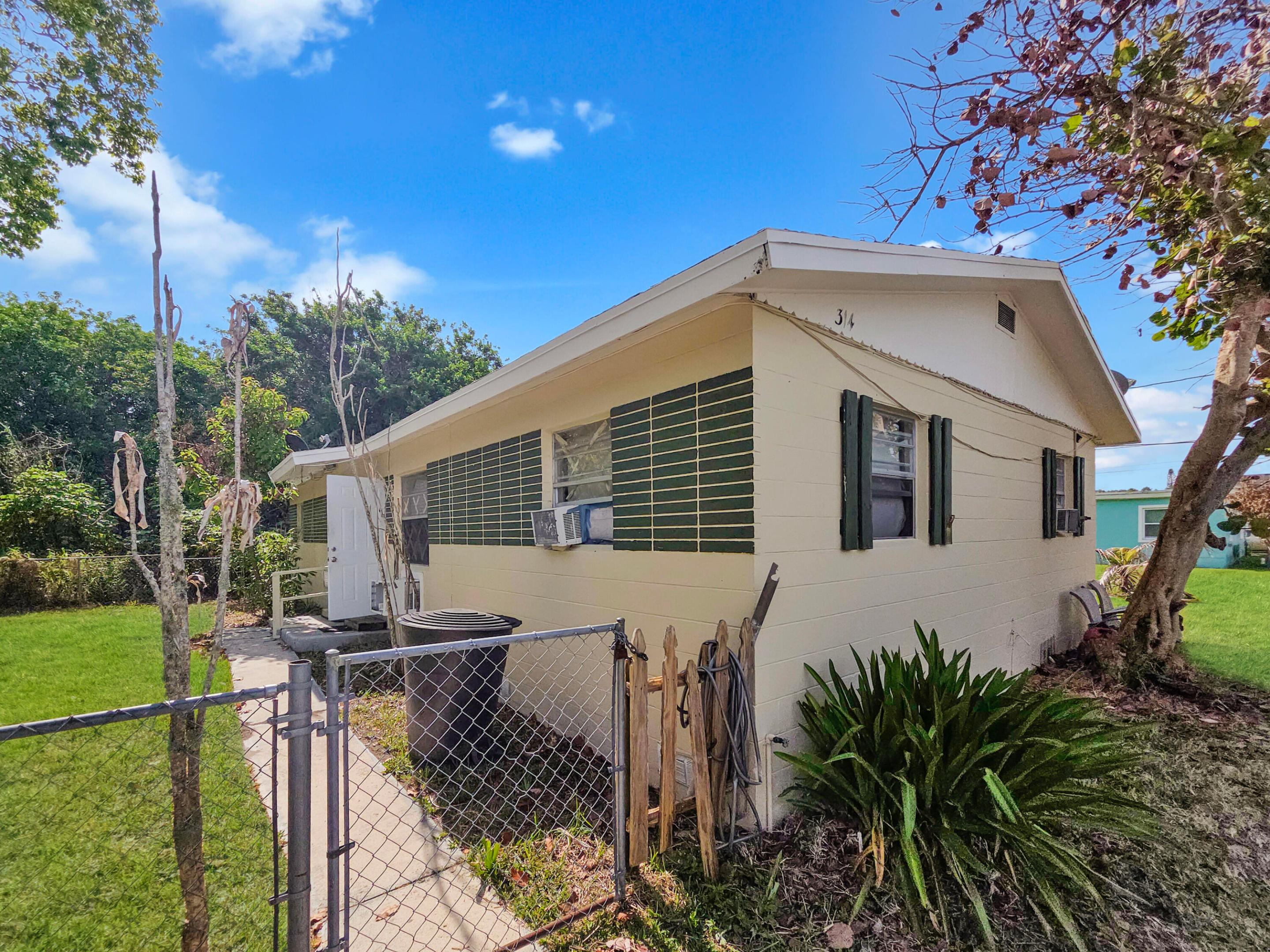 2/1 each side CBS duplex on a large and private lot! Occpied on both sides, rents are below market but monthly.