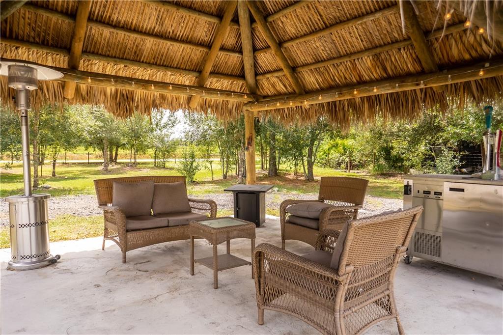 "AMAZING OPPORTUNITY" THIS MANUFACTURE-HOME IN MONTURA RANCH is situated in a private fenced lot (1.39 Acres) with the BEST of living in a rural setting. This Single wide manufactured home (2021) has spacious living area with 3 bedroom and 2 bathroom. This property includes a recreation area in  front, with a guano cabana and another recreation area in back with a pool (Smartliner above ground pool)  The Community offers a Clubhouse featuring a swimming pool, recreation facilities, parks, playground and basketball courts. The community center also hosts afterschool programs and summer camps for kids and the Early Childhood Center is next door. This property is just what you're looking for. Make this your dream home now! NO Homeowners Association FEE. Montura Ranch Estates is a rural community of South Central Florida in Hendry County residing between the cities of Clewiston and LaBelle. Centrally located within 1-1.5 hours from Miami, Naples, Fort Myers, Cape Coral, Fort Lauderdale, West Palm Beach, Port Charlotte and Okeechobee.Montura also has a Private Reservoir for landowner use that allows horseback riding, camping, fishing, and hunting.This place offers peace and quiet along with added safety for the family.