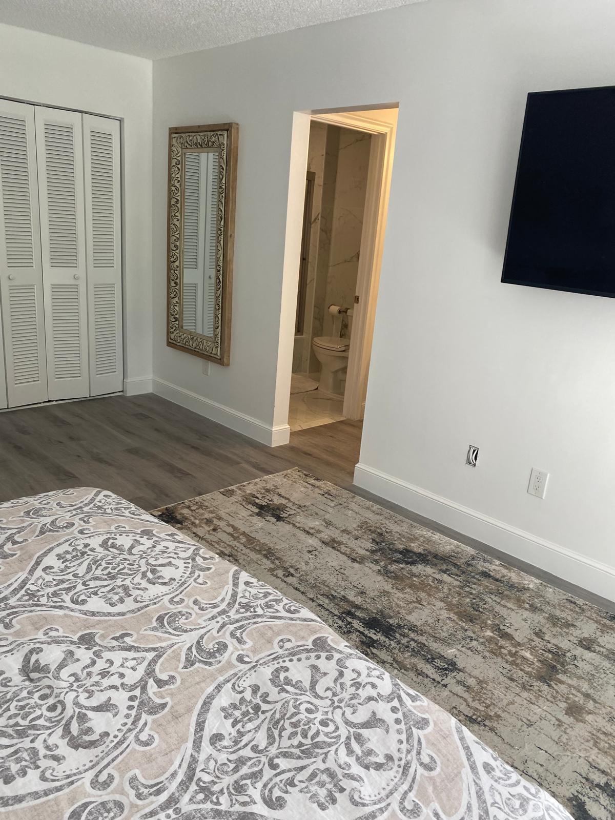 Horizons of Boca Lago is ALL-AGE COMMUNITY with no mandatory membership! This  amazing  2BR/2BA condo is  flooring in the bedrooms and tile throughout the main living areas & popcorn ceiling removed. The kitchen boasts granite countertops and stainless steel appliances. Enjoy a split-bedroom layout with plenty of closet space, a private screened balcony, and in-unit washer and dryer. AC 2023,  per association roof installed 2023. Condo dues include cable & internet. The Horizons community offers a clubhouse and pool and located near the FL Turnpike, dining, and shopping. Perfectly maintained and move-in ready—schedule your showing today! Note: No mandatory equity or membership requirement! Furniture's as shown of photos are included!