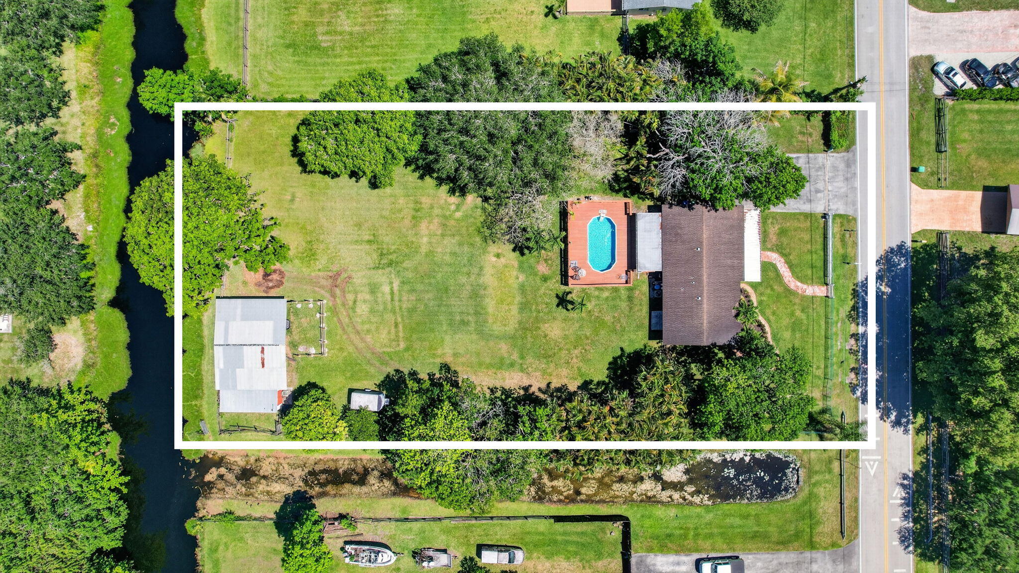 Located in prestigious Southwest Ranches, this beautifully maintained 3BR/2BA home with den sits on over an acre of fenced land along a canal, offering space, privacy, and a highly desirable lifestyle. Features include a pool, 4-stall barn with paddock, updated kitchen, bathrooms, flooring, and electrical panel (2019), plus HVAC and water heater replaced in 2018. Plenty of room for entertaining, outdoor living, boats, RVs, or future additions, all while enjoying one of Broward County's most sought-after communities with convenient access to major roads, shopping, dining, and A+ schools.