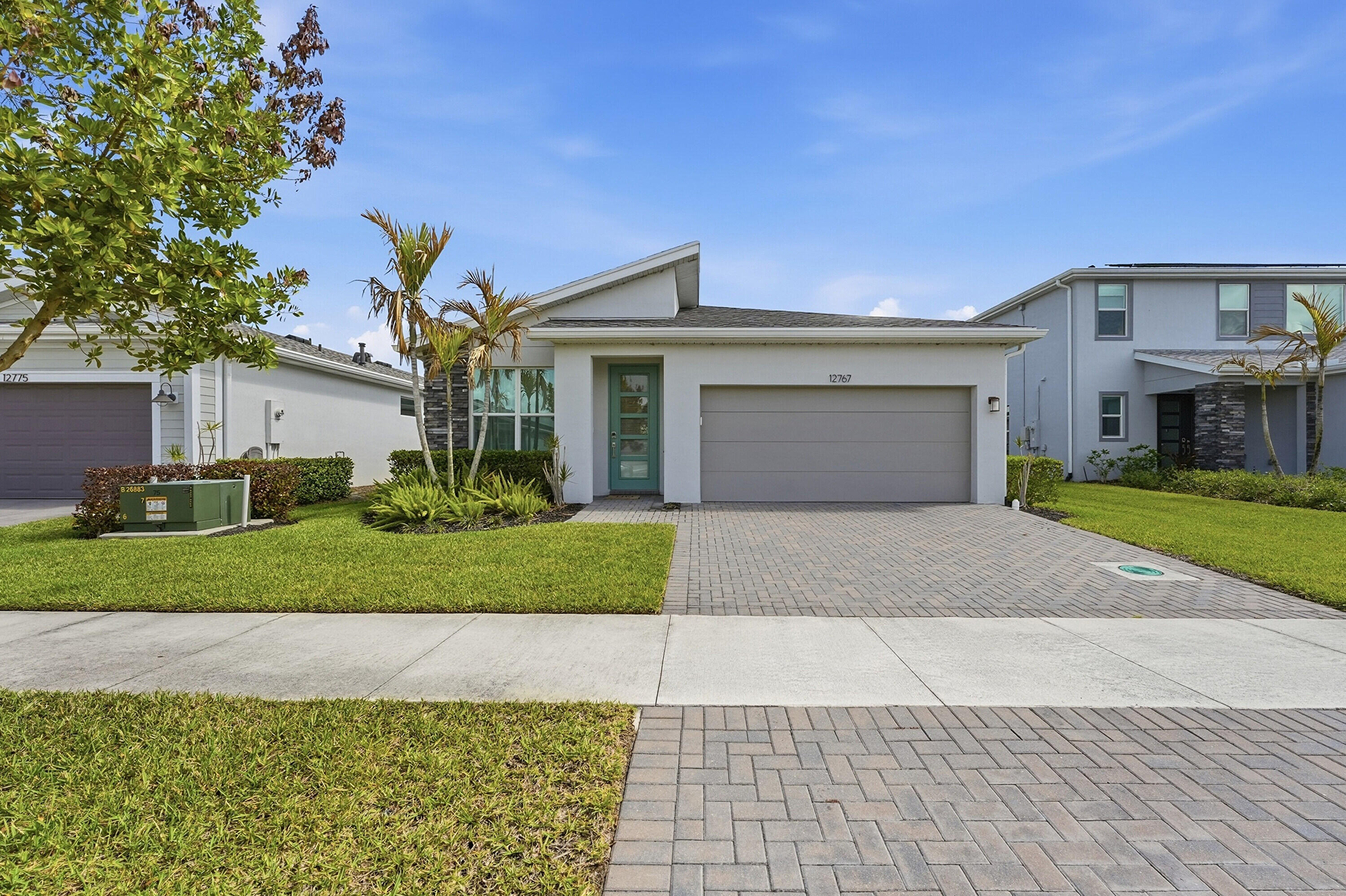 Built in 2022, this 4-bedroom, 3-bath single-story home in a gated community features an open, light-filled layout with peaceful lake views. The kitchen offers a large island, quality appliances, and flows seamlessly into the living and dining areas. The spacious primary suite includes a private bath and walk-in closet, while additional bedrooms provide flexibility for family or guests. Enjoy hurricane impact windows and a 2-car garage with an electric vehicle charger. Relax on the patio overlooking the lake. Community amenities include a clubhouse, pool, and fitness center, with HOA covering cable, internet, and landscaping. Conveniently located near shopping, schools, and major highways.