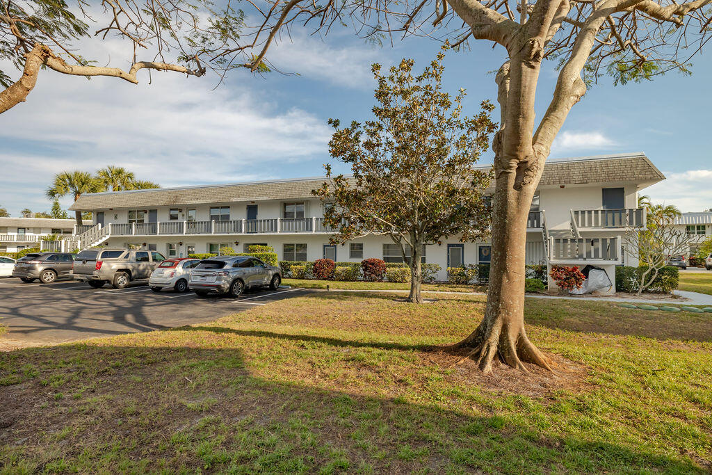Priced to move! Come live the Florida lifestyle in this fully furnished 2-bedroom, 2-bath condo just minutes from the beach and downtown Stuart's shopping and dining. This light-filled retreat features an open layout, spacious bedrooms, and a glassed-in lanai to embrace the coastal lifestyle. Nestled in a well-maintained community, amenities include cable & Wi-Fi, recently remodeled sparkling pool, clubhouse, shuffleboard, water, sewer, trash, common area maintenance, master insurance policy, and extra storage. Don't miss this opportunity to own your slice of paradise! This listing is being sold furnished except: recliners and 55" TV in the living room, Brita water filter and air fryer in the kitchen, printer and security lights around the home.