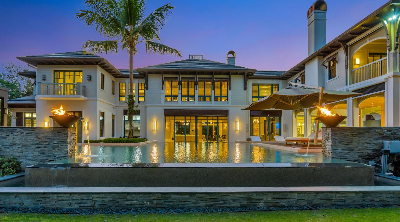 Welcome to this exceptional estate located within the one-acre enclave of the prestigious Old Palm Golf Club.  Designed by Randall Stofft , Architect, this magnificent 5-bedroom residence offers over 9,000 square feet of luxurious living space with a thoughtfully designed floor plan and impeccable attention to detail throughout.

Ideal for both everyday living and grand entertaining, the home features multiple gathering spaces, including an impressive game room and private theater. The expansive second-floor primary suite is a true retreat, complete with his-and-her bathrooms and walk-in closets, with convenient elevator access nearby. Four additional en-suite guest bedrooms, along with a dedicated office and private gym, provide exceptional Comfort and flexibility. Outdoors, the resort style pool and patio are enhanced by exotic water features, creating tranquil, spa-like setting perfect for relaxation or entertaining.  Ideally situated in the heart of the Palm Beaches, Old Palm offers easy access to major highways, world class dining, shopping, and entertainment. This full service golf club community features a 33-acre practice facility and a 20,000 sf lifestyle center, with full golf membership required.