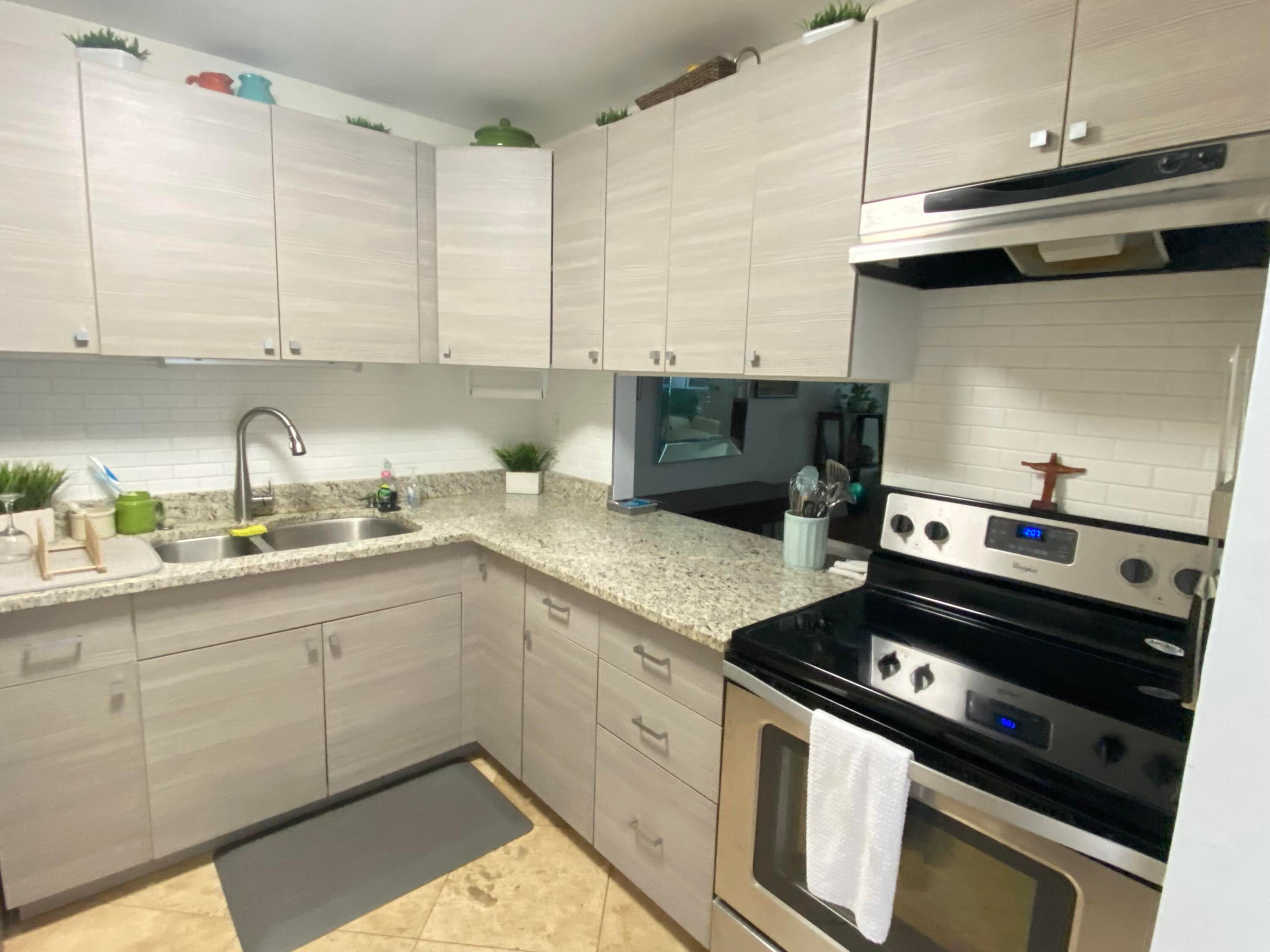 Beautiful updated, condo in 55 plus active community! Just minutes to the Atlantic Ocean and Palm Beach! Leave those cold winter days behind and own your own PARADISE in South Florida, Palm Beach County! Newer modern kitchen, with soft close cabinets. Newer appliances. Updated, modern bathroom. Newer neutral flooring and walls throughout. (furniture included) Convenient to all major retail and shopping as well as major interstate, I95 West Palm Beach downtown and beaches are just 20 minutes away! Hurry, don't miss out on this incredible opportunity to relax in S Florida sunshine! Bring your offer today! Maintenance monthly fee includes water, basic cable and internet, shared laundry, reserves, no property tax