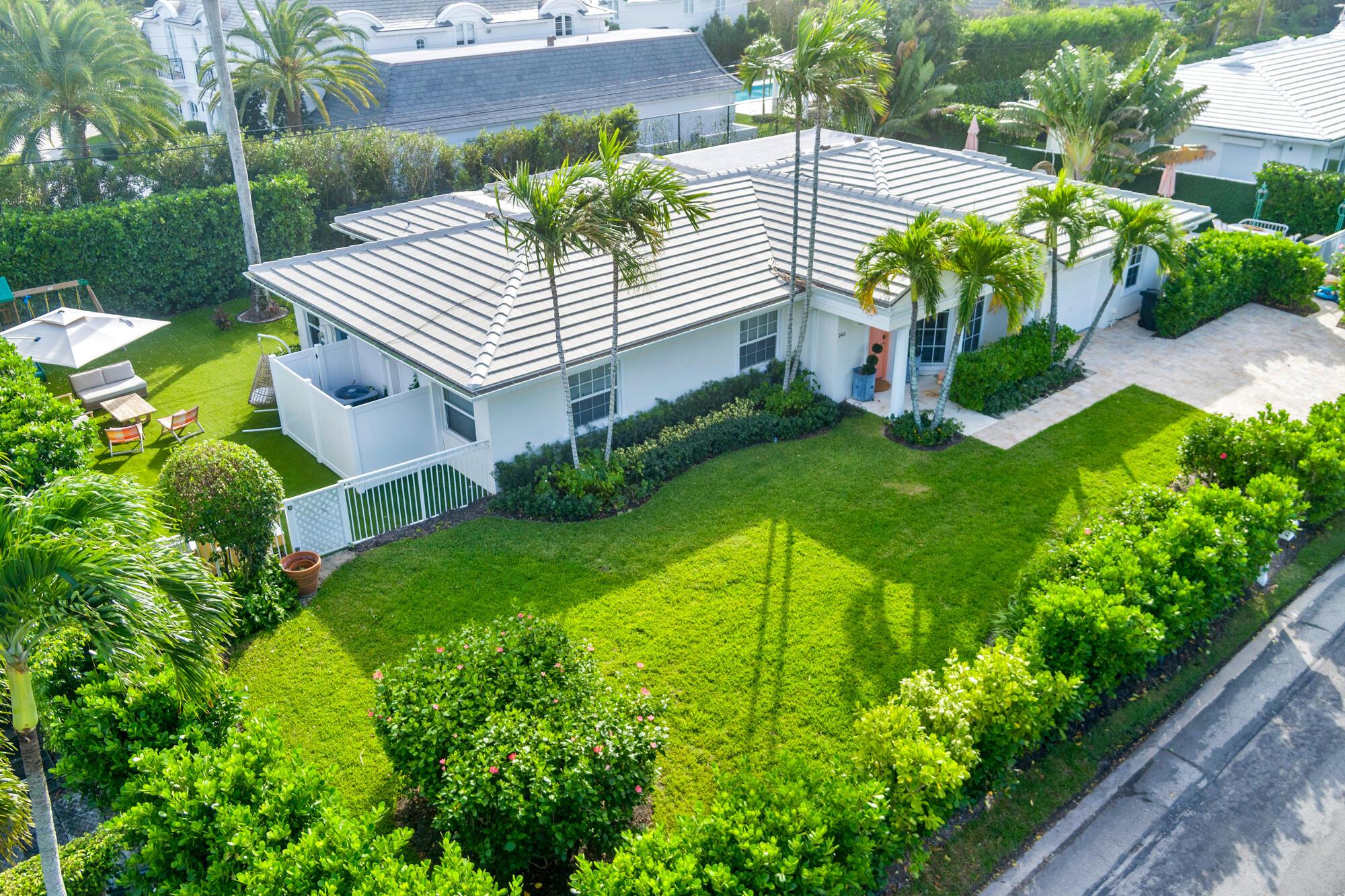 One-story Bermuda style residence featuring split floor plan encompassing spacious primary suite plus three additional bedrooms for guests. This elegant Ellen Kavanaugh decorated residence pay homage to the island's vibrant aesthetic and lush surroundings. El Dorado as a street offers residences a quaint feel among other single-story residences giving the feeling of light along the street. This residence allows extra privacy while enjoying outdoor spaces including the large terrace off the primary bedroom with Plantwell landscaping and nontoxic artificial turf and private lush tropical landscaping surrounding the pool area. The home contains a newer a/c unit servicing the primary bedroom and two eastside guest bedrooms, a Culligan water filtration system Haifa Limestone throughout most of home, large scale windows, and bamboo trees giving the home a beautiful back drop making this home elegant from day to night. Enjoy all Palm Beach has to offer with the beach access at Ocean Lane, Lake Trail within walk distance, and the close proximity to town.