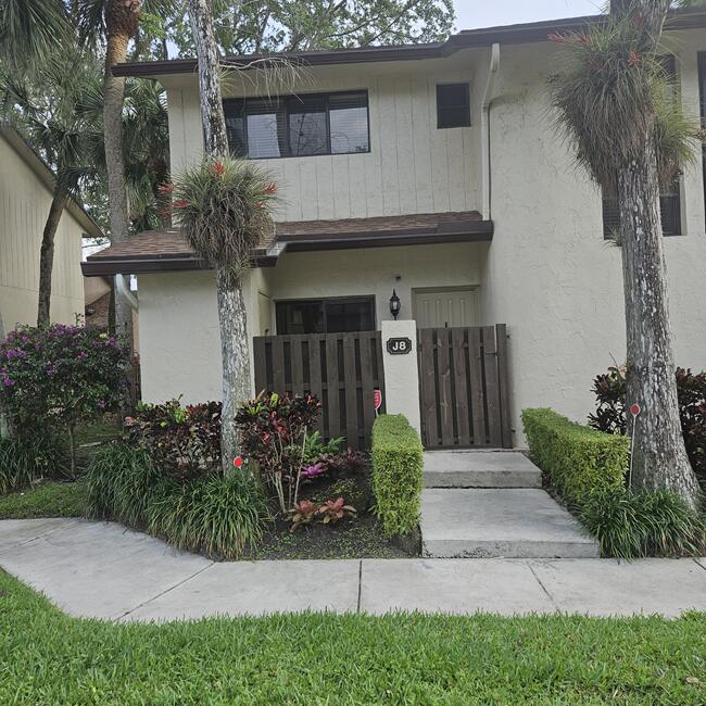 Beautiful, immaculate corner unit townhouse in Bonaire Village. Renovated kitchen with white cabinet/shelves and quartz countertop, Stainless steel fridge, stove, dishwasher. Eat in kitchen with recess lighting. Cooking season storage and large pantry with pull out shelves. Step down to formal dining room and living room. Upgraded 1/2 bath on first floor. Large master bedroom and huge walk in closet. Laminate flooring down stairs. Fenced front yard and backyard with nice plastic and concrete slab flooring. Extra storage room in front. No renting allowed in this community.