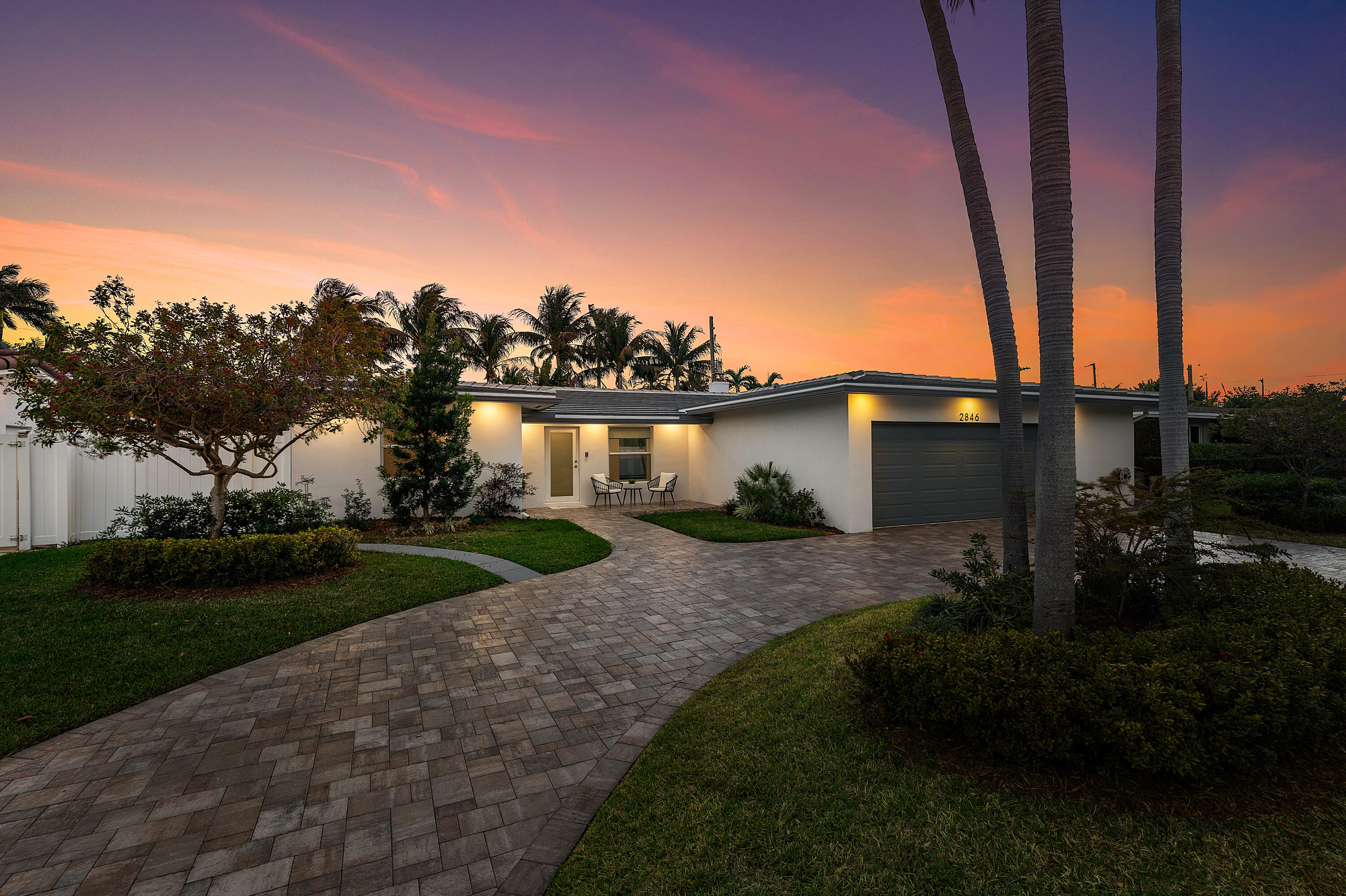 In one of Lighthouse Point's most sought-after residential pockets, just moments from Frank McDonough Park, the Lighthouse Point Tennis Center, local marinas, and the Intracoastal. 

Every major component has been updated: roof, AC, ductwork, sewer lines, PVC plumbing, electrical, impact windows, fencing, lighting, fireplace, bar, and landscaping. It's true turnkey living.

Inside, 3 x 3 porcelain tile runs throughout, complemented by a 16-speaker sound system. The kitchen is centered around a quartz island with matching quartz vanities in the baths. Motorized shades and TVs in every room create a seamless, move-in-ready experience. The primary suite is spacious and includes its own dedicated laundry room. Outdoors, a newly paved circular driveway adds presence. The backyard features porcelain pavers, a saltwater pool, and a summer kitchen with wet bar. A separate 200 SF pool house suite with full cabana bath functions perfectly as a fourth bedroom, office, or guest quarters.

Oversized two-car garage with added storage. Low pool and lawn maintenance.

The information published and provided including but not limited to prices, measurements, square footages, lot sizes, features, finishes, and calculations are subject to errors, omissions or changes without notice. All such information should be independently verified. All parties should perform their own due diligence to verify all information.