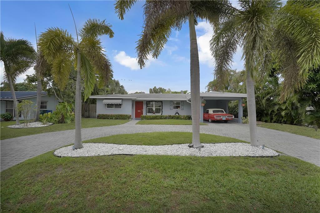 Well maintain 3 bedrooms 2 bath home in the heart of Oakland Park!  A plus factor separate one bedroom and full bathroom mother-in law suite with private entrance! Also ideal for an "Air B + B. House renovated in 2013 with features new roof, hurricane impact windows, tankless water heater, air conditioner, 20-inch porcelain tile floors, throughout, other features -pavers in circular drive.Home is a great open floor plan opening to private fenced back yard with a dynamite pool area. Ideal for entertaining! Professional landscaping with professional lighting! Outside of house painted in 2017.great master bedroom with sitting area. Awnings entire length outside of house on west side with 3 ceiling fans! Pool re-marcited with LED color changing lights and new tile. Entire attic insulated.Lawn sprinklers converted to city water to avoid stains on house and cars from well water.