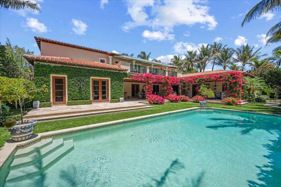 Located on one of the most ultra prime, sought after tree-lined streets, this level 5 totally renovated 5/6.1 is only second house from the ocean! Extraordinarily scaled, it boasts high ceilings, stunning finishes, easy flowing floor plan and the most magnificent gardens by Nievera-Williams. Its oversized outdoor loggia is an extension of the generous living areas, and an upper terrace adjoins the 3 second floor bedrooms.  Designed for the Palm Beach lifestyle, this ''filled with character'' treasure includes a striking Mizner-style beamed living room,  a gourmet eat in kitchen, gracious entry, elevator,  limestone, marble and wood floors and more. It is truly a move in ready home, you can enjoy immediately.