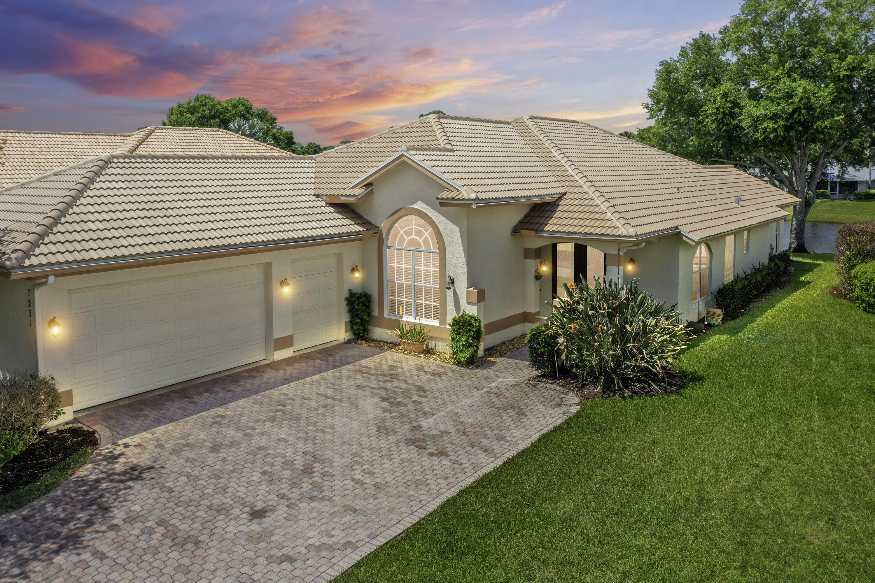 Experience luxury living in the prestigious, gated golf course community of PGA Village. This stunning lakefront residence features 3 spacious bedrooms, 2.5 baths, and a versatile den/office perfect for remote work. The heart of the home boasts a sleek kitchen with granite countertops and stainless steel appliances, complemented by elegant tile and wood laminate flooring throughout. Peace of mind comes standard with a brand-new roof installed in 2025 and 24/7 manned security. Enjoy world-class amenities including a clubhouse, resort-style pool, fitness center, billiards, basketball, and pickleball. Perfectly situated with easy access to I-95, this home offers the ideal blend of comfort, style, and convenience. Schedule your private tour today to witness this lakefront gem!