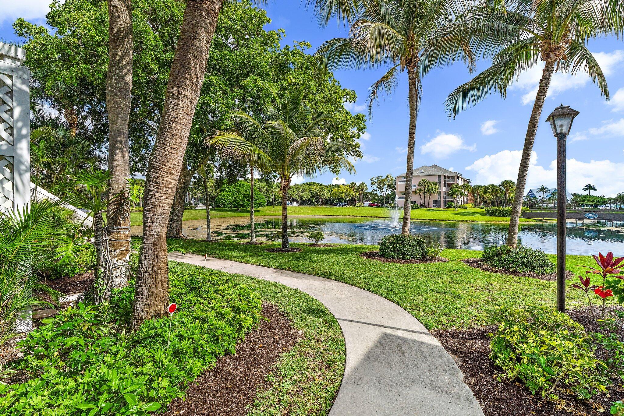Jupiter Bay Plantation Villa B8...Available now to Dec 15 at Off-Season rate and Available March 2027 at Season Rate...BRAND NEW KITCHEN...such a nice Villa...Northeast exposure location overlooking the Lake and baby steps to the walkover to the Beach. Give us your dates to come enjoy this Short Walk to Beach. Small Furbaby permitted. .Furnished condo in walk to the beach, pool, shops, Harbourside Place...all of the lifestyle that Jupiter supplies along the beach strip.