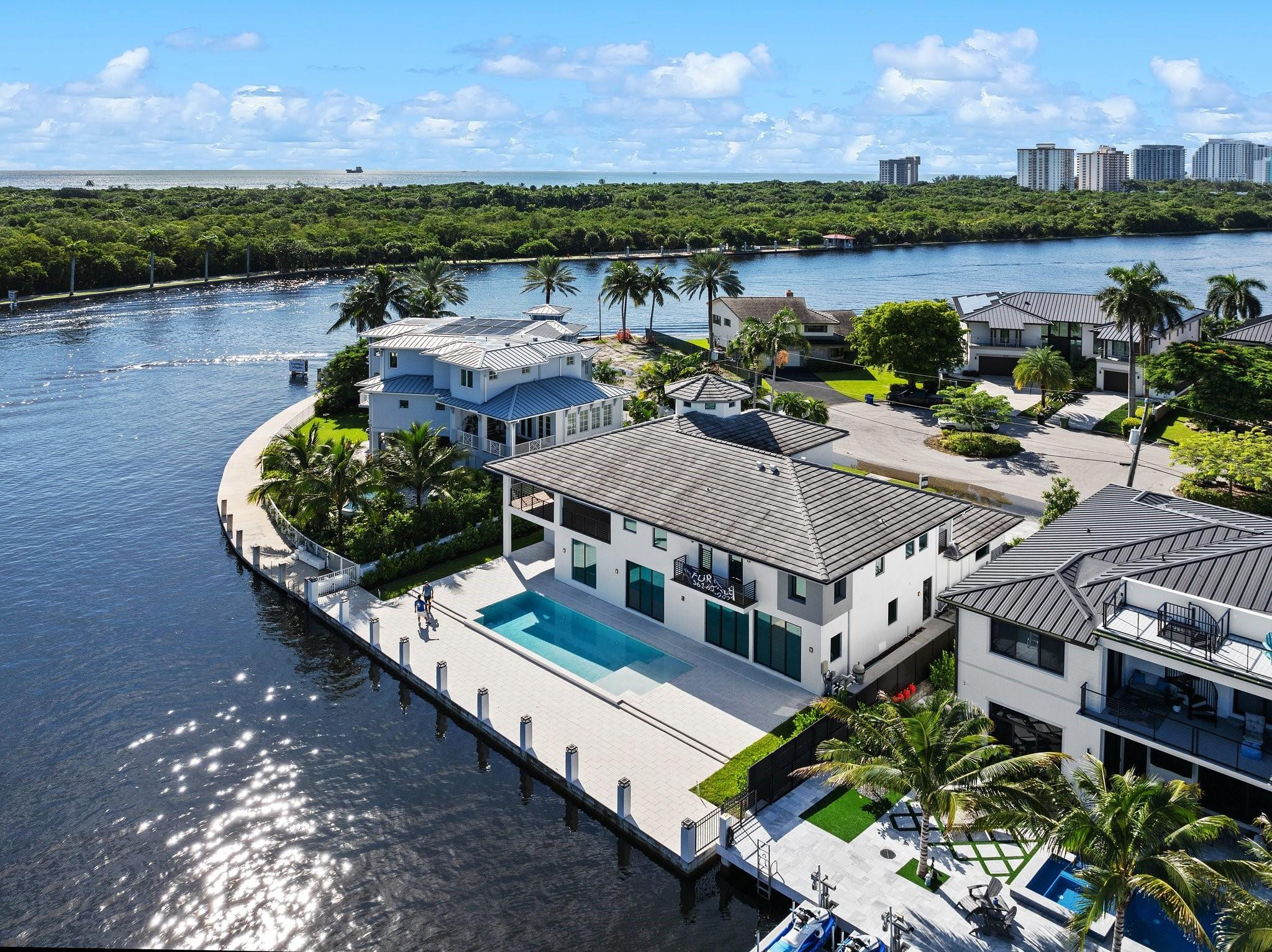 Quite possibly the best deal in east Fort lauderdale for a totally renovated deep water home. There is no better option than this modern masterpiece at $900 psf.  It truly is an impressive property on an equally impressive cul-de-sac just 1 off the point.  Bring your yacht and sail in to the 90 ft poured concrete dock with 100 amp power.  The majestic lower level is a haven for entertaining with the massive custom kitchen and giant island centered around various living spaces. Walls of 9ft glass sliders provide water views from the entire lower level.  The upstairs primary is the perfect retreat with gorgeous balcony overlooking the Intracoastal.  This 800 sq ft suite has a custom closet to die for and beautifully designed bathroom adorned with marble.  Walk to the beach, park and mall.