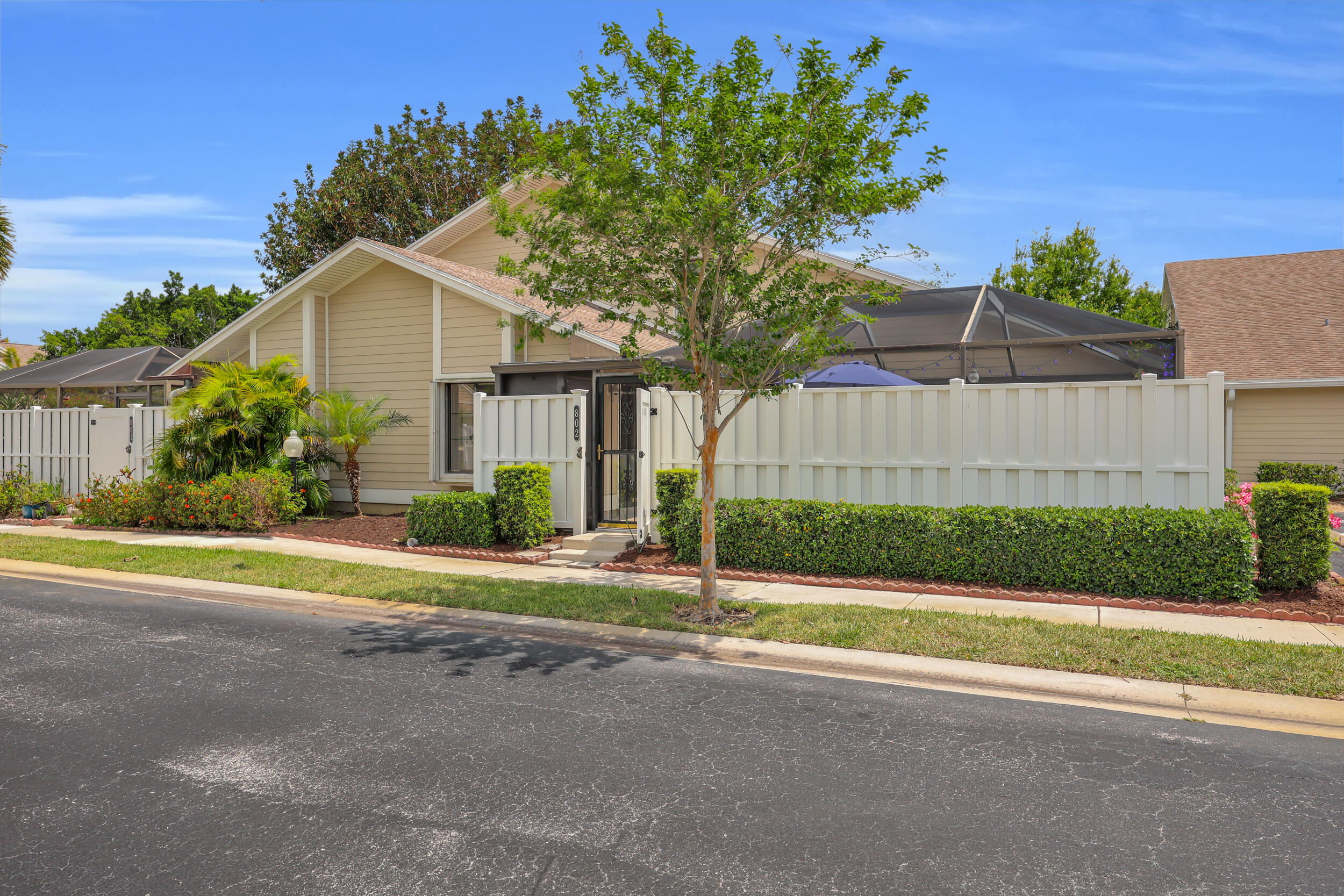 Filled with natural light, this charming Summer Winds home offers a spacious and flexible layout in the heart of Jupiter. The main level features two generously sized bedrooms and two full bathrooms, along with an open kitchen, dining, and living space that flows seamlessly out to a private patio — creating the perfect indoor-outdoor setting for relaxing or entertaining. Upstairs, a versatile loft provides endless possibilities and can easily be converted into an enclosed third bedroom, office, or additional living space depending on your needs. A standout feature of this property is the rare addition of two covered parking spaces , a unique upgrade from the single covered space most homes in the community offer. Residents also enjoy access to a heated and chilled community pool, making it enjoyable year-round.  Conveniently located close to A-rated Jupiter schools, shopping, dining, beaches, and everything Jupiter has to offer, this home presents an incredible opportunity for someone looking to put their own personal stamp on a property. With great bones, abundant light, and an ideal location, 802 Summer Winds is ready to be reimagined into something truly special.