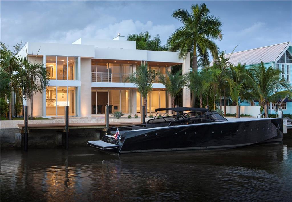 Las Olas modern masterpiece with cutting edge architecture by Robert Tuthill, world class interiors by Antrobus + Ramirez Design, and built by award winning builder Jeff Hendricks. This new construction residence features 7,800 sq ft of luxury indoor and outdoor water front living, 5 bedrooms, 5.5 baths, 3 car garage, expansive covered balconies, Poggenpohl/Boffi cabinetry, wine room, wet bar, game/media room, gas fireplace, elevator, prewiring for smart home, and pool with infinity spa.