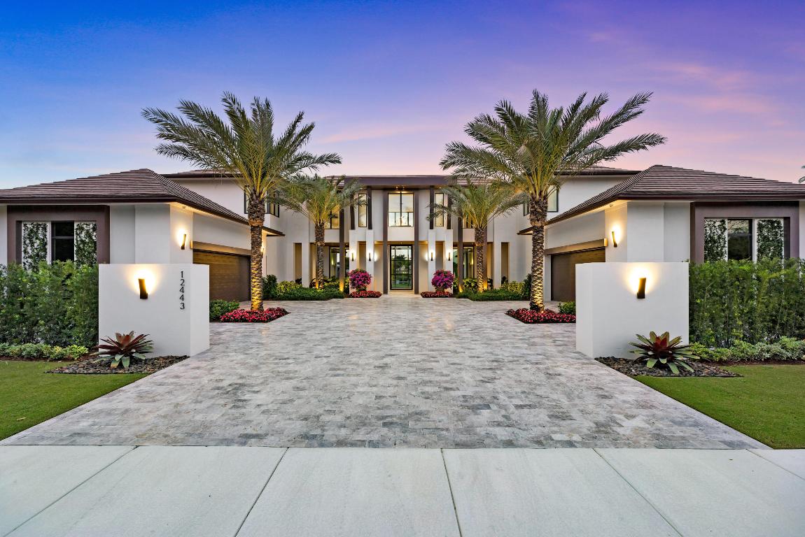 El Sueno is a one-of-a-kind home in the sought-after Palm Beach Polo & Country Club. Primark Partners have collaborated with Affiniti Architects, Decorators Unlimited, and RWB Construction to create this 11,654-square foot 5 bedroom contemporary property boasting 144' of water frontage. Rare marbles were imported from the hills of Italy, gorgeous walnut cabinetry was sourced from Canada, and custom furniture was meticulously designed to give the home an exclusive touch. A gourmet kitchen with Subzero and Wolf appliances, large master suite with morning bar, his and hers master bathroom, and three large second-story guest bedrooms with en suite bathrooms top the list of features. Additionally, no detail was spared in the design showcasing an outdoor kitchen and resort-style pool & spa. Additionally, no detail was spared in the design with large format Italian porcelain and custom oak wide plank wood floors, a wine room and bar, two fireplaces, plus an outdoor space showcasing a fire pit and resort style pool and spa. This property is a must see!