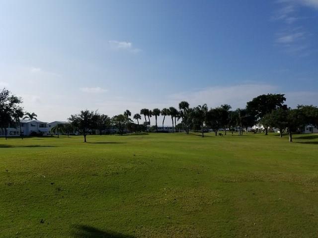: Thinking Golf how about free golf pick up your bag and go to the 1st T Very nice unit Freshley cleaned waiting for your toothbrush. Recent upgrades to kitchen and bath nicely tiled, newer kitchen appliances still look great. 55 + community with lots to do 2 heated pools 4 club houses game room, welcome center and much more. Great location close to the beach and easy commuting. vacant easy to show
