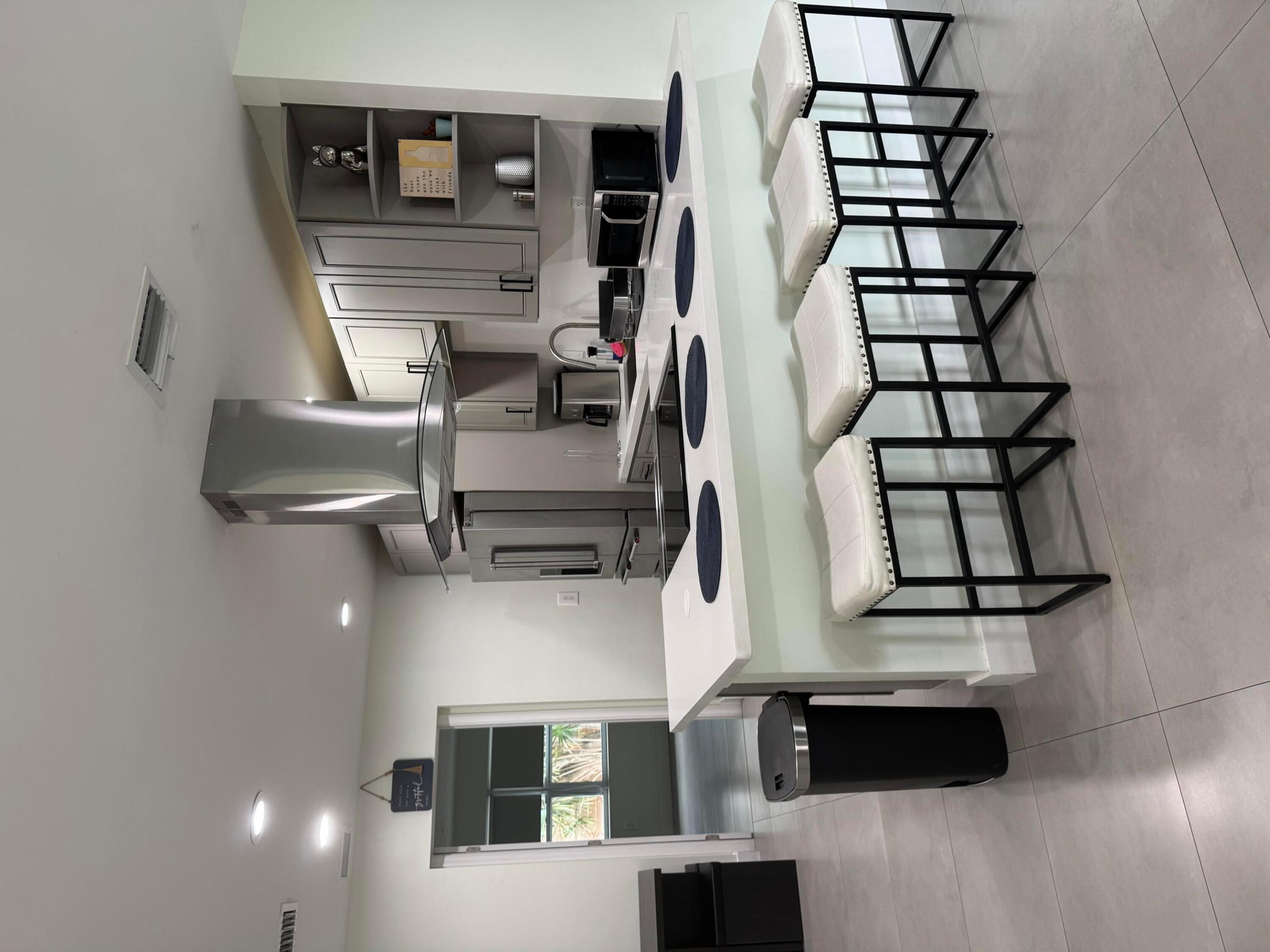 beautifully remodeled, this home offers comfort and style from the moment you arrive. It features 3 spacious bedrooms and 2 full bathrooms, perfectly set up for an easy, move-in-ready stay. Private laundry with fenced in yard & patio. NO HOA! A must see

Enjoy your own private home cinema, ideal for relaxing movie nights. Step outside to a peaceful backyard oasis with a mature tree and a cozy outdoor lounge area.

Located in West Palm Beach, this home is a perfect rental opportunity, combining a great location with quality living and convenience.