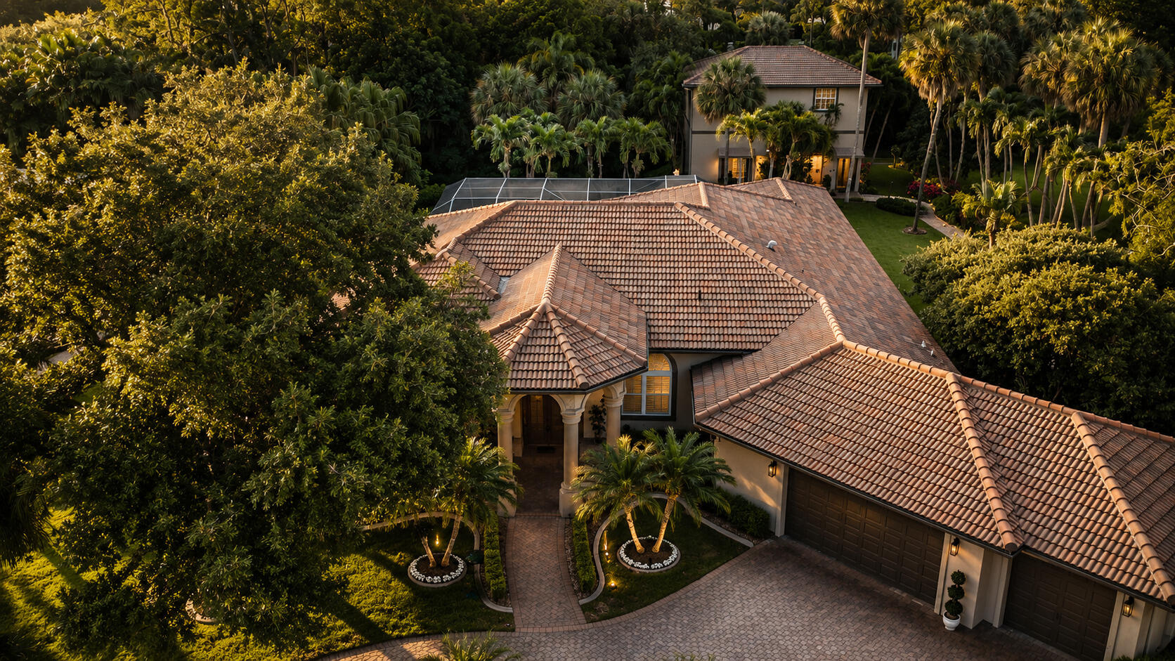 Welcome to one of Parkland's most exceptional estate properties. Proudly offered by its original owner, this meticulously maintained residence combines luxury, flexibility, and long-term value on a quiet private street with NO HOA.  One of the property's most remarkable features is the nearly 2,000 sq. ft., two-story detached guest house with soaring volume ceilings. Offering two bedrooms, one bathroom, a kitchenette, laundry room, loft, and private entrance, this incredible space is ideal for multigenerational living, long-term guests, a private office, or an exceptional income-producing opportunity. Best of all, it can be purchased fully furnished, allowing the next owner to begin generating rental income immediately.  Enjoy complete peace of mind with major recent upgrades, including a NEW ROOF (2021) and FOUR NEW A/C UNITS (2022). Additional premium features include a whole-house generator serving both the main home and guest house, impact windows, accordion shutters, a comprehensive security system with wired video surveillance, and dedicated RV parking complete with full electrical hookups. There's also ample room for your boat, trailer, or other recreational vehicles.  The main residence offers five spacious bedrooms and three beautifully appointed bathrooms. The chef's kitchen features granite countertops, custom cabinetry, dual ovens, a center island, and a breakfast nook overlooking the resort-style pool. Multiple living areas are enhanced with built-in surround sound, smart lighting, and thoughtful custom details that make everyday living and entertaining effortless.  The insulated, air-conditioned garage offers incredible flexibility as a home gym, workshop, hobby space, or car enthusiast's retreat. Even better, the existing gym equipment is included with the home.  Step outside to your own private backyard oasis featuring a screened saltwater pool, a fully equipped outdoor kitchen with grill, refrigerator, and cooktop, lush tropical landscaping, professional landscape lighting, a screened gazebo, expansive green space, and exceptional privacy.  A brick paver circular driveway with an oversized parking area provides abundant space for family and guests, while the dedicated RV parking with full electrical hookup is a rare feature seldom found in Parkland.  Properties offering this level of care, extensive upgrades, flexible living space, income potential, RV accommodations, and resort-style amenities rarely become available. This is more than a home. It's a private estate designed for luxury living today while providing exceptional flexibility and value for years to come.  Recent Updates: NEW Roof (2021) | FOUR New A/C Units (2022) | Water Heater (2018 with transferable 10-year warranty)