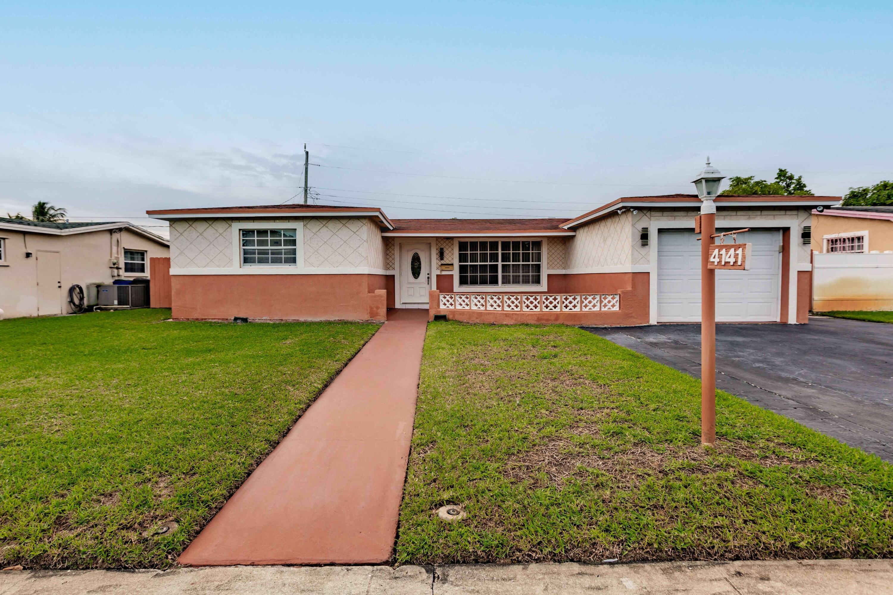 Nicely kept and miticulously maintained single family pool home in the viblant community of Lauderdale Lakes. Features a single garage with ample open parking for additional cars with a fenced back yard for privacy, and no association fees. Must see to appreciate.