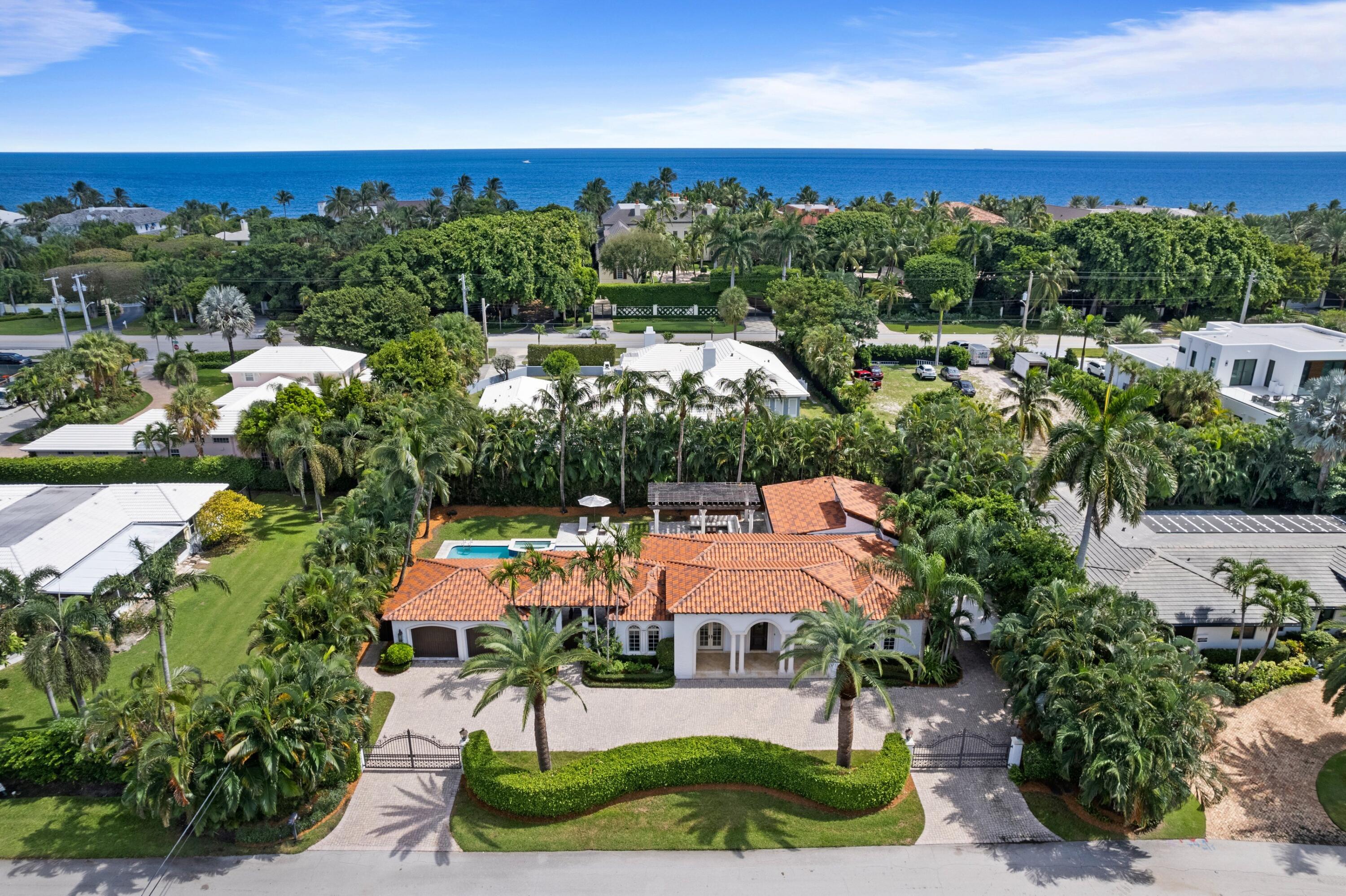Mediterranean, Mizner Style estate home nestled in Seagate Neighborhood in coastal Delray Beach.
This beautiful home is characterized by a gourmet kitchen, a generous master suite, a 40 foot resort pool, tropical garden, and impact windows and doors. 
It is located steps to the beach and the lively restaurants and shops of Atlantic Avenue.