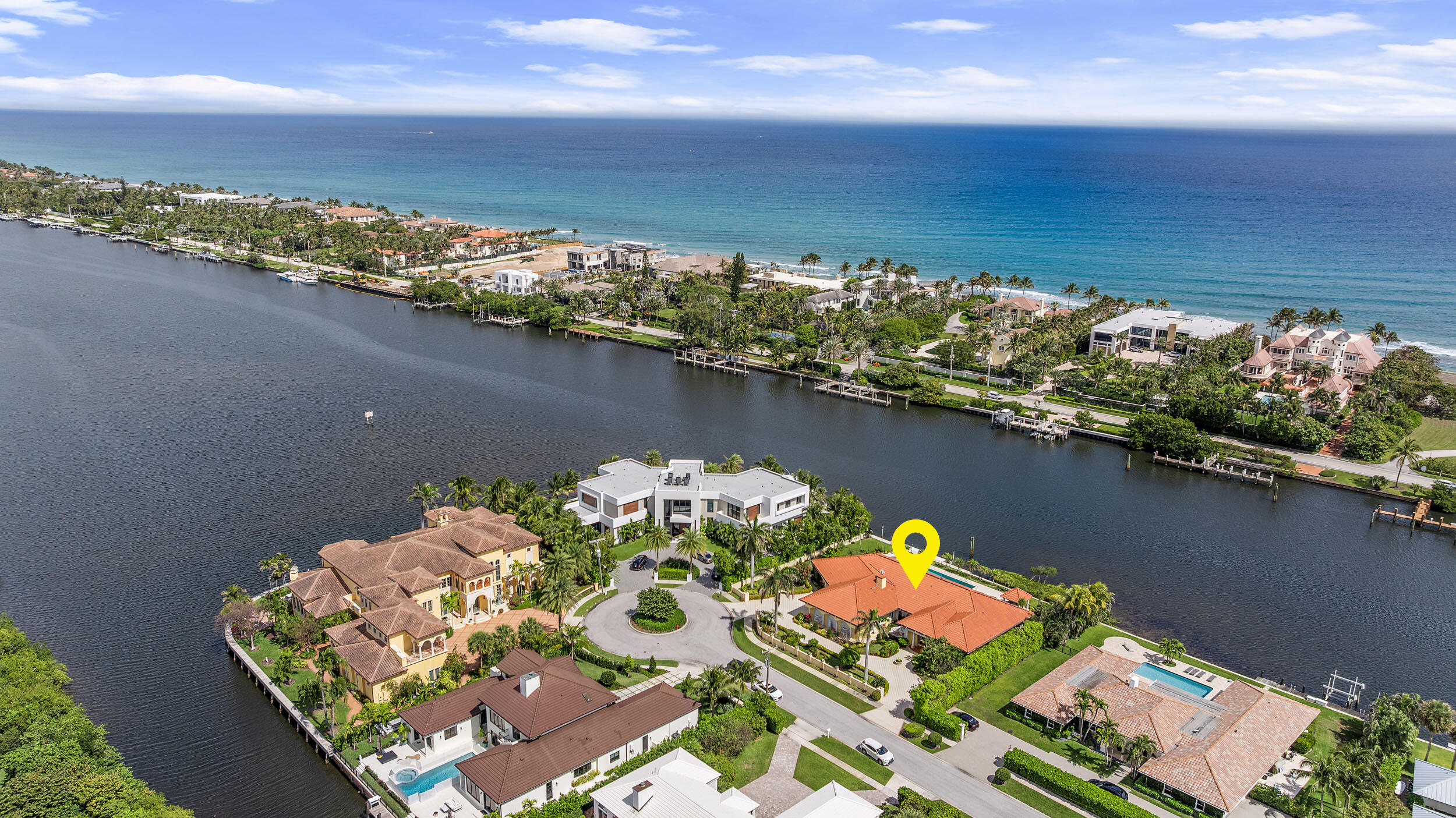 Welcome to The Palace, a rare and extraordinary double-lot estate boasting 150 feet of direct waterfront with no fixed bridges, offering unparalleled access to the Intracoastal. Nestled at the end of a cul-de-sac within a man-gated enclave of Manalapan, this 6-bedroom, 6.5-bathroom residence, including a maid's quarters with a full kitchen, is a true testament to luxury and craftsmanship.

Transport yourself to Sicily with exquisite imported features, from gold-leaf trims and Honey Onyx columns to Egyptian and Indian fabrics adorning the walls. Every detail reflects uncompromising quality and timeless elegance.

This estate is move-in ready with a 3-year-old roof, all impact windows and doors, and a three-zoned AC system to ensure comfort year-round. The chef's kitchen features granite countertops and stainless steel appliances, while the screened-in patio is the perfect place to savor your morning coffee with breathtaking waterfront views.

The resort-style pool area is an entertainer's dream, complete with a summer kitchen overlooking the serene Intracoastal. Located in the ultra-exclusive town of Manalapan, home to some of the most luxurious real estate in the world, this estate offers a secluded paradise just minutes from world-class shopping, dining, and pristine beaches.

A true jewel of the Intracoastalthis one-of-a-kind residence must be seen to be believed!