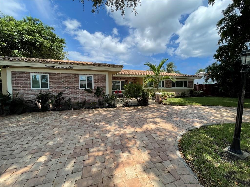 Exquisite home in Lighthouse Point, this property features 4 bedrooms, 3 bathrooms, Hurricane Impact Windows and Doors, Stainless Steel Appliances, Modern Flooring, Open Floor Plan, Tons of Natural Light, Walk In Closets, Resort Style Pool (New Resurfaced Diamond Brite Finish), Pool Heater, Lush Landscaping, Fruit Trees, Privacy & Large Backyard. Home is located in a premium location near shopping, restaurants ,great schools & highways. C Great Family Home that is spacious & can be used for entertaining.  OWNER OCCUPIED.