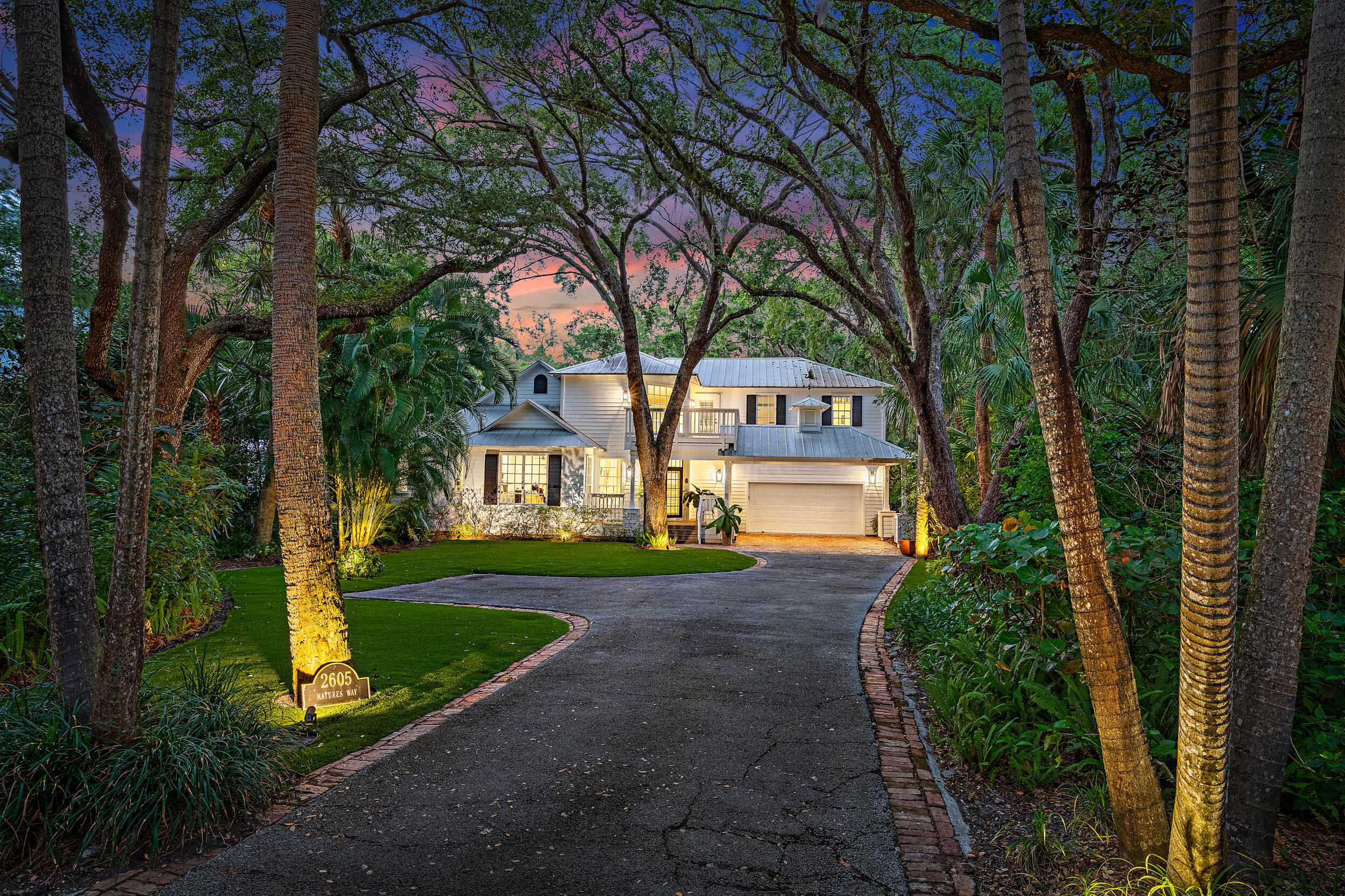 Tucked within Nature's Hideaway, a private gated enclave of just 17 homes, this bespoke preserve community offers a setting that feels straight out of a postcard, with mature landscaping and a truly serene atmosphere. This beautifully updated residence is light, bright, and thoughtfully designed, featuring an open-concept layout and expansive windows that fill the home with natural light. The kitchen flows seamlessly into the main living areas, creating an ideal space for both everyday living and entertaining.  Surrounded by lush, mature landscaping, the property offers an exceptional sense of privacy—making it a rare opportunity to enjoy both a boutique community setting and a secluded, peaceful retreat. Ideally located with easy access to I-95 and the Florida Turnpike, this home offers both privacy and convenience. Enjoy close proximity to the Gardens Mall, world-class shopping, and a wide selection of top restaurants, making this an exceptional place to call home. Homes with this level of charm are extremely rare in our area and seldom come available—this won't last long!