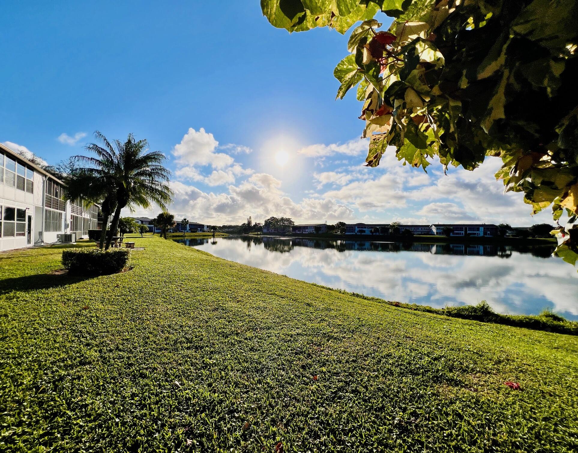 GORGEOUS VIEWS-VIEWS-VIEWS IN 55+ CENTURY VILLAGE! Lovely First Floor 2/1.5 In The Desirable Chatham Section. Nicely Maintained With Neutral Tile Flooring Through Out, Brand NEW AC, and Updates to Each Bath. Long Screened Lanai Offers The Perfect Spot to Enjoy The Gorgeous Views! Accordion Shutters Front & Back Offer Easy Lock & Leave Storm Protection. Sold Furnished. Century Village Is A Vibrant 55+ Community Centrally Located In Highly Desirable Palm Beach County, Florida! Enjoy An Active 55+ Lifestyle With Resort Style Amenities... Century Village is a 55+ Resort Style community with so much to offer - Much To Offer - shows, movies, clubs, pools, security, and transportation service. The Clubhouse features a theater, indoor pool, card room, community/party room, billiard room, shuffleboard, tennis, pickleball, bocce, and two outdoor pools, Numerous heated outdoor pools throughout the community. Separate fitness center with gym and outdoor heated pool & resistance pool. Two guarded gates and 24-hour roving security patrol.
