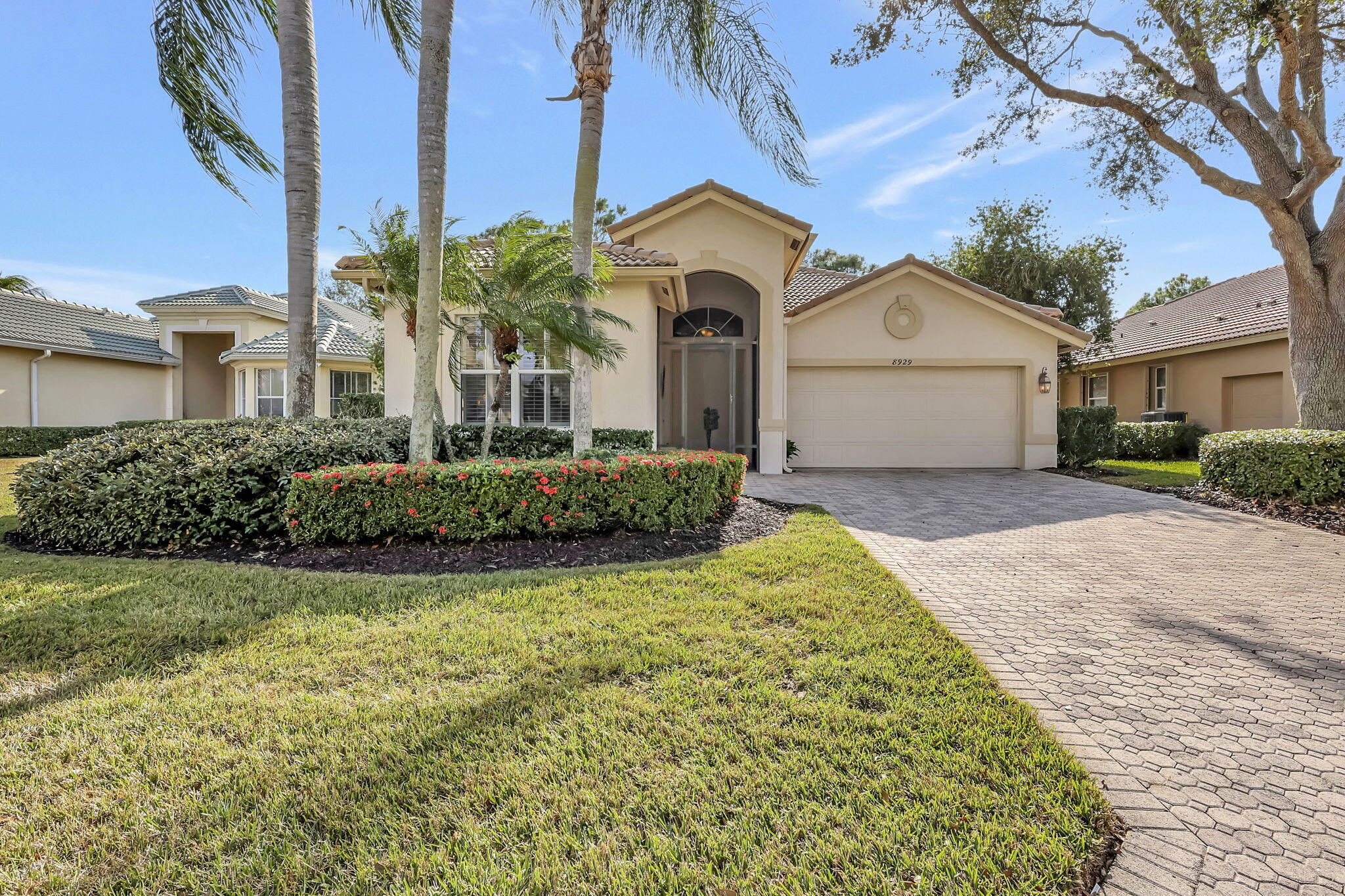 Best Value in PGA Village, one of the Treasure Coast's most sought-after communities. This beautifully appointed 3 possible bedroom home offers 2,100 + square feet of thoughtfully designed space, blending timeless elegance with everyday entertaining. A welcoming split-bedroom layout features 3 full baths, a powder room, and a sophisticated home office highlighted by custom floor-to-ceiling built-ins. The chef-inspired kitchen is the centerpiece of the home, showcasing rich granite countertops, stainless steel appliances, and is ideal for gatherings. Designed for indoor-outdoor living, the home opens to an oversized screened lanai with sweeping golf course and lake views. A serene backdrop for morning coffee, evening cocktails, or entertaining friends. County only taxes, a must see. Located within the premier PGA Village, residents enjoy a lifestyle defined by convenience, recreation, and natural beauty. HOA dues include cable, internet, lawn care, security, common area maintenance, and full access to the Island Club, the community's vibrant amenity center. With County-only taxes, optional golf memberships, and an excellent location. This home offers an exceptional blend of luxury and value. There's a Master Association managed by Castle Group and Kingsmill HOA managed by Vesta Property Services. $400 PGA application and $75 Kingsmill application fee (docs attached). Seller currently pays $965.05 quarterly to PGA Village and $500 quarterly to Kingsmill HOA. Buyer/Buyer's agent to confirm HOA dues for new owner and capital contribution totals.