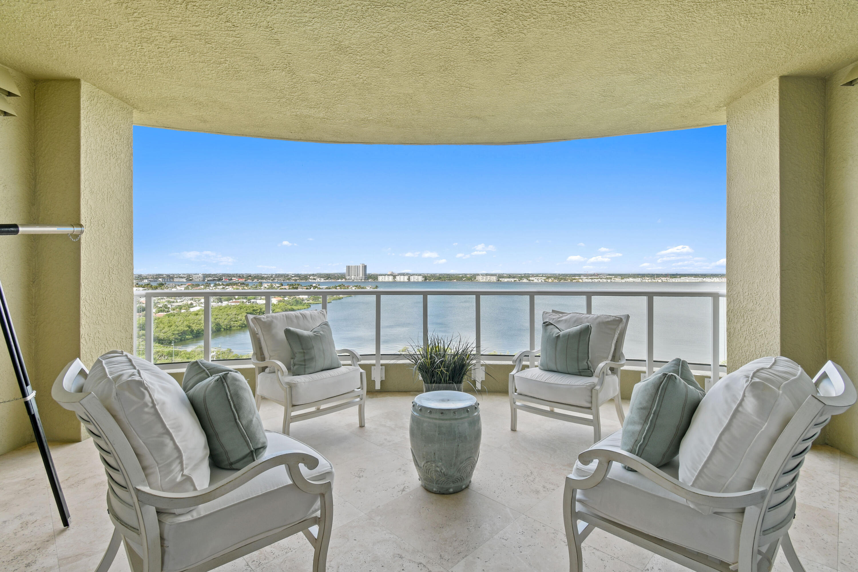 Experience the epitome of coastal luxury living in this stunning 3-bedroom, 3.5-bath residence, offering the rare combination of breathtaking ocean and Intracoastal views. Ideally situated in Singer Island's most prestigious and exclusive address — Ocean's Edge — this boutique enclave of just 40 residences delivers the perfect balance of private oceanfront living and resort-style amenities. A private elevator opens directly into your grand foyer, creating a dramatic and sophisticated arrival. Inside, the expansive great room is framed by floor-to-ceiling windows that flood the space with natural light and capture water views from every angle.  The primary suite is a true sanctuary, featuring two oversized walk-in closets with custom built-ins and a spa-inspired en-suite bath complete with a Jacuzzi soaking tub and a spacious walk-in shower. Step onto your wraparound balcony to take in panoramic views from sunrise over the Atlantic to sunset across the Intracoastal   and enjoy the sparkling West Palm Beach skyline as evening falls.  The third bedroom (or office) features its own full bath and closet, providing flexibility for guests or remote work. Each bedroom enjoys private balcony access, creating a seamless blend of indoor-outdoor living and offering serene water vistas throughout.  A sprawling west-facing terrace extends the living space outdoors   perfect for alfresco dining, sunset cocktails, or quiet evenings watching the water reflect the vivid colors of the Florida sky.  The gourmet kitchen is a chef's dream, appointed with top-tier appliances and bespoke finishes including a Miele double oven and warming drawer, Miele espresso maker, Sub-Zero refrigerator and wine cooler, and a Wolf five-burner gas range with pot filler. Custom cabinetry, granite countertops, an instant hot water system, and a double stainless-steel sink elevate both form and function.  Residents of Ocean's Edge enjoy an unparalleled lifestyle, complete with 24-hour manned security, white-glove concierge service, and a state-of-the-art fitness center with his and hers locker rooms. Additional amenities include a spacious media room, an oceanfront club room with a catering kitchen and bar, and a heated south-facing pool and spa offering all-day sun   all set against the backdrop of pristine, private beaches.  Live each day as if on a perpetual vacation, surrounded by world-class dining, premier shopping, championship golf, and the very best of South Florida's coastal lifestyle.  Public Remarks: Ocean's Edge is not subject to building inspections, as they apply only to structures that are 25 years or older. Their 2-year concrete restoration was project was finished in October 2024. Last year, they completed their structural integrity reserve study and updated their standard reserve study, both of which are available on their owners' website. All assessments have been paid.