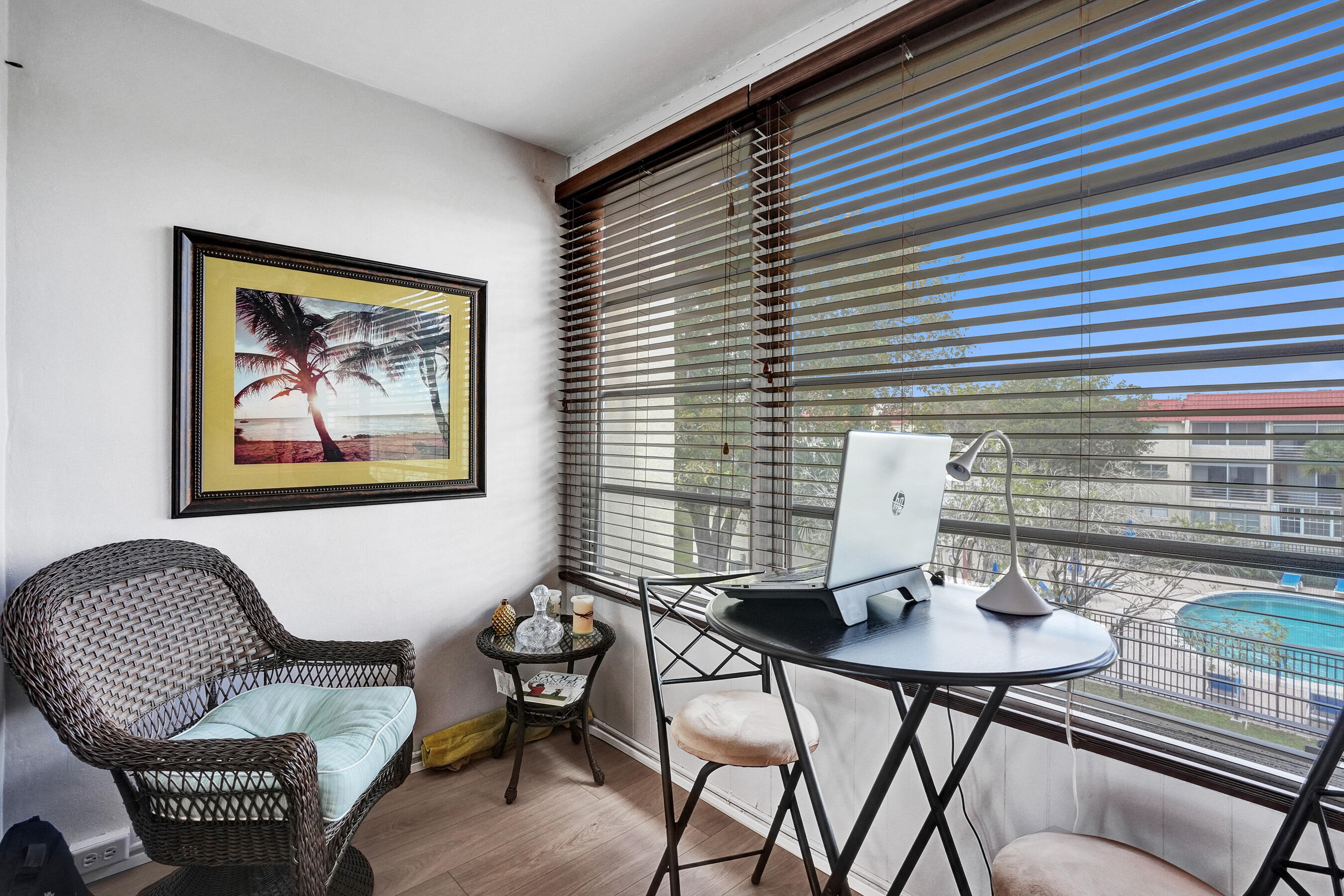 Beautifully remodeled 1-bedroom, 1-bath condo in the serene Sunrise Lakes community. This pristine unit features an updated kitchen with granite countertops, gleaming ceramic tile flooring throughout, and modernized bathrooms for comfort and convenience. A tranquil patio provides the perfect space to relax and enjoy the outdoors with stunning pool view. Natural light floods the living areas, highlighting tasteful finishes and a thoughtful open layout. Ready to move in, this charming home invites you to live with comfort and style. Come see it today and make it your own.