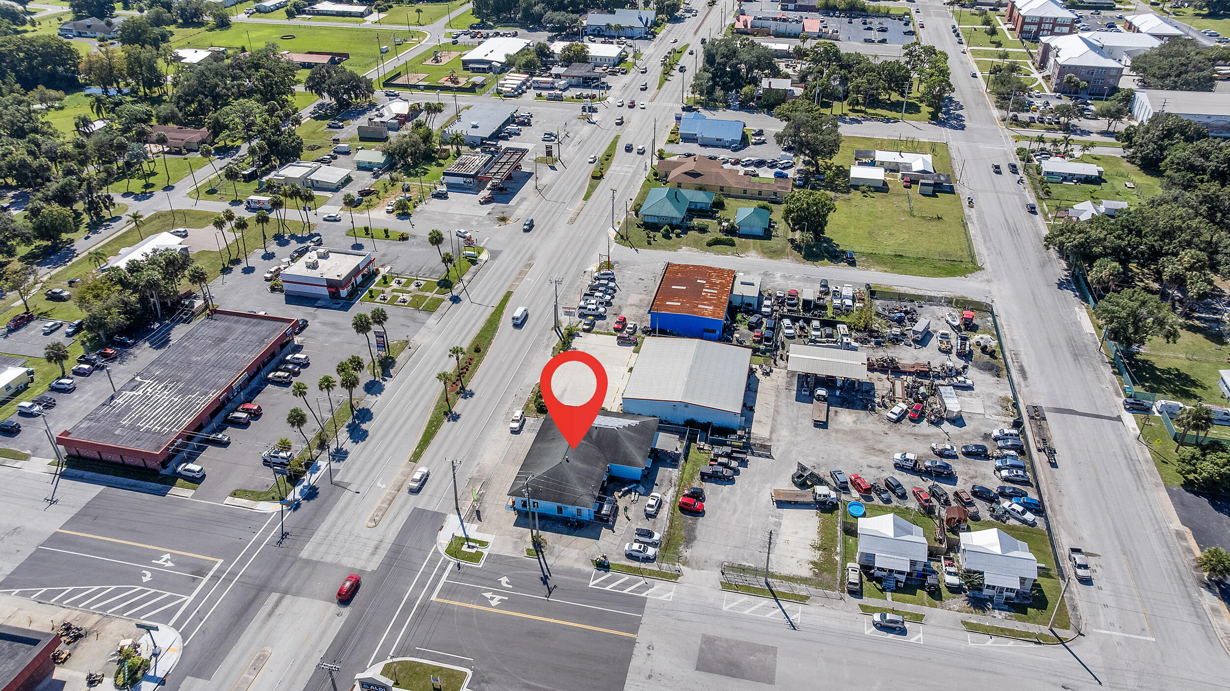 Exceptional opportunity to own a 3,880 sq. ft. 3-unit commercial building and thriving dry-cleaning business in one of Okeechobee's highest-traffic areas—directly across from Aldi and on the main route to Home Depot, Walmart, and Publix. Sale includes the building, profitable dry-cleaning operation, one established tenant, and one additional retail space ready for lease. Excellent visibility, signage, and parking. Located amid Okeechobee's growth corridor with planned new Home communities and the planned Bass Pro Fishing Resort at Lake Okeechobee—bringing jobs, tourism, and higher retail demand. Ideal for investors or owner-operators seeking strong income and long-term appreciation.