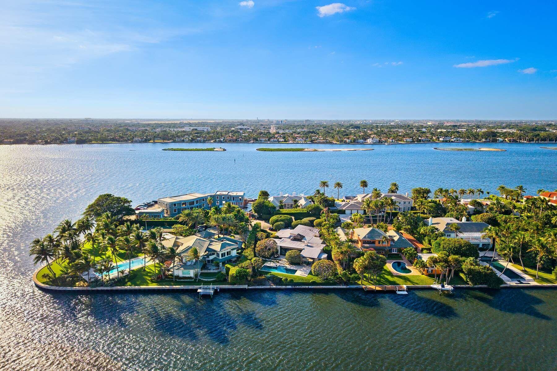 Only property available on Everglade Island. Long open water views on the quiet east side of Everglades Island. Positioned just two lots from the southern tip, this home offers extraordinary views across to Palm Beach's estate section. Enjoy sunrises and shimmering water vistas from your future dock--already approved for a generous 614 sq ft structure with two boat lifts and quick access to deep water. Whether you're an avid boater or simply seeking serenity, this location delivers unmatched beauty and convenience. The existing home is in excellent condition and features a high-ceilinged, light-filled living room that spans the eastern side of the house, perfectly framing the breathtaking water views. The house can be updated or enjoyed as-is while you design a spectacular new residence.  Offered for the first time in nearly 50 years, this is a truly special waterfront property in one of Palm Beach's most exclusive enclaves. The Everglades Island neighborhood also benefits from private security patrols, ensuring peace of mind and privacy.