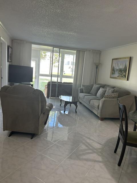 Enjoy peaceful garden view from your private back patio in this beautifully furnished ground-floor property. Feel safe knowing that during the upcoming hurricane season you are protected by the impact windows and doors . Located just minutes from Sawgrass Mills, Broward Mall, Walmart, CVS, Walgreens, Publix, a variety of restaurants, and fast-food options — plus only 30 minutes from the beach. Community amenities include: One main pool + two smaller pool, Tennis court, Pickle Ball court, Billiards, Clubhouse with kitchen, BBQ area & Tiki Hut, Approx. 2 miles of walking trails. Weekly activities and more.  No Leasing, No pets.  Seller is motivated — don't miss this opportunity!