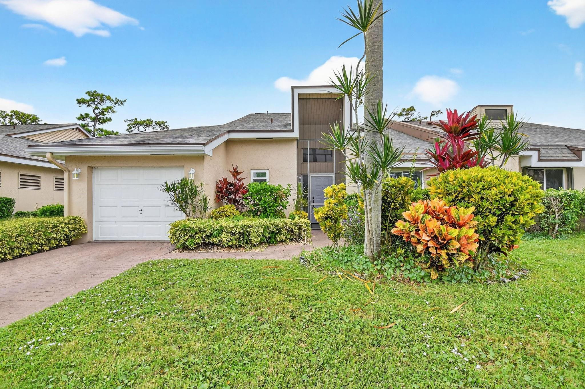 Very well maintained 3-bed, 2.5-bath villa with golf course and canal views located in the 55+ subdivision at The Fountains of Lake Worth. Roof and exterior painting completed in 2021 and covered by the HOA, which also includes TV, internet, landscaping, lawn care, and access to the community pool. Impact windows except for patio & decorative window. Features newly refinished marble floors, soaring ceilings, a formal dining room, and a spacious open living area perfect for entertaining. Includes an attached 1-car garage and screened-in patio to enjoy the golf views. The Fountains offers optional golf and social membership packages for those seeking a resort-style lifestyle. All measurements are approx. & should be verified by buyer. Info deemed reliable but not guaranteed. Easy to Show.