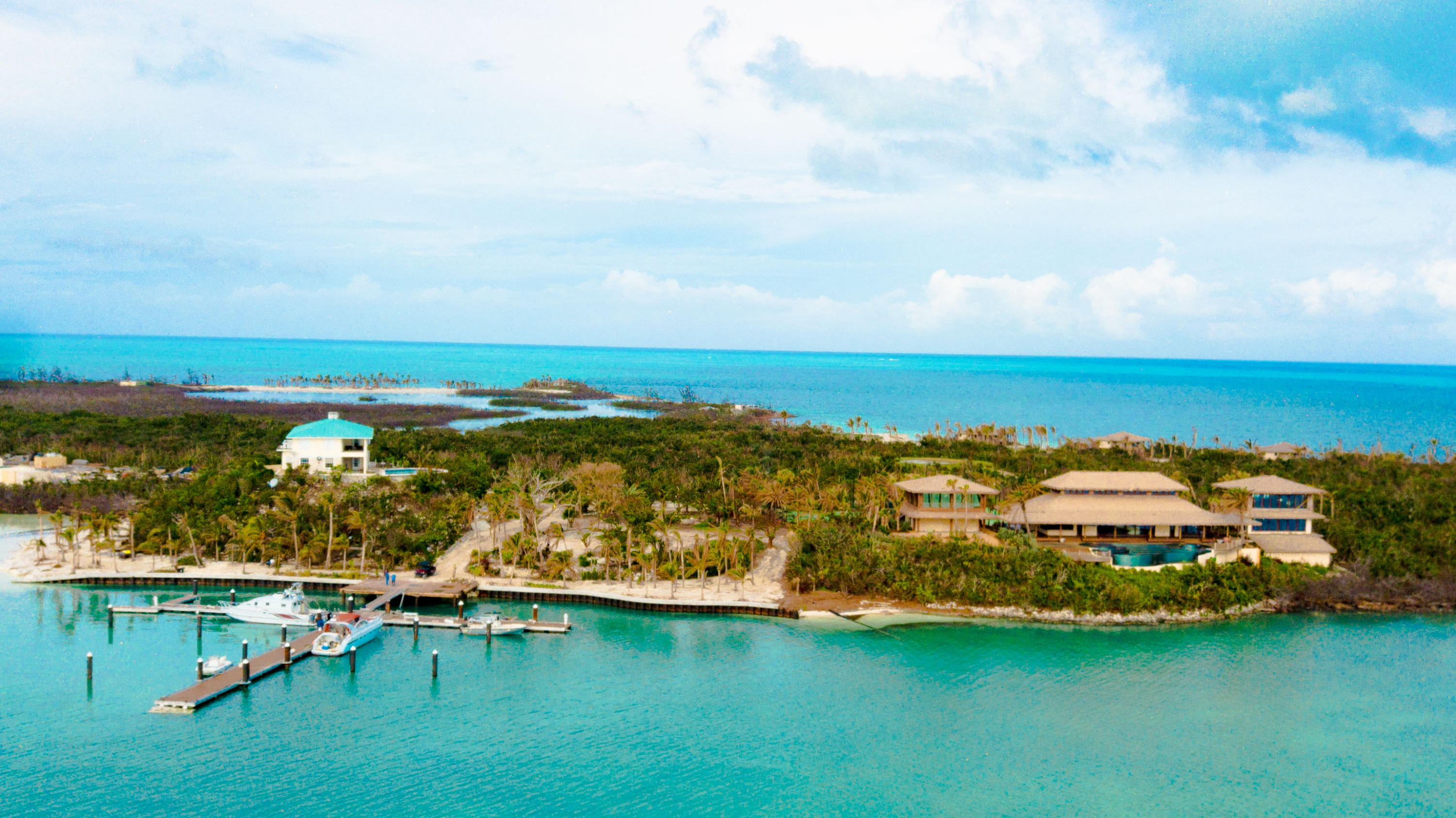 A private estate multiple island compound of this caliber – with these amenities and substantial infrastructure rarely becomes available. Approximately 277 acres consisting of one main island, and eight adjoining islands such as Seahorse Cay, Bakers Cay, Sandy Cay, Felix Cay, Mermaid Cay and Sponger's Cay- all freehold with some long term leasehold islands combine to yield the utmost in privacy and ample options for future development. Frequented by pirates in the 16th Century   who's cannons and empty treasure larder were discovered near one of its pristine white sand beaches, Big Grand Cay eventually became a retreat for wealthy inventor Robert Abplanalp and his best friend, the 37th US President Richard M. Nixon. Purchased in 2015 and completely transformed into a "5 Star" retreat. Amenities include two beautifully appointed main residences and eight luxurious cottages   each with breathtaking views. At the main islands core is the Great House- the family gathering center with its own huge glass tiles pool with swim outs, all overlooking the entry marina and natural rock outcroppings. Adjacent to that is the main dining room and in another building within the complex, a world class gym   all with stunning turquoise views. Serviced by a professionally equipped stainless steel kitchen with walk-in freezers, pizza ovens etc.
The quality of the interior finishes are equal to the best seen in Palm Beach or Beverly Hills using craftspeople flown in for their unique specialty. The marbles, hardwoods and fittings are all the very best money can buy   with equally luxurious furnishings   no expense spared and every detail attended to. Moreover, each home or guest villa has its own personality   from Asian to "Tommy Bahama" to contemporary. The original 1950's coral stone home also has been updated   but still features the "Nixon" bedroom and library, and several former Secret Service dwellings remain for storage and future use.
Infrastructure includes generators which power the entire compound, de-salt plant for ample fresh water, outstanding storage buildings, three complete homes for staff and a dormitory building which can accommodate several dozen people with a full kitchen, gathering area and dining hall. A commercial loading dock an ancillary marina is nearby for deliveries.
These islands are a short boat ride over living coral reefs from world famous fishing destination Walkers Cay, and is lushly landscaped with exotic hardwoods, bougainvillea, orchids and palms   including hundreds of mature coconut palms lining the beaches. Tennis, pickle ball, basketball and athletic courts add options for your family and guests and a complete array of "toys" come with this purchase.
This is a special opportunity to own your dream   a private island retreat for family, friends or corporate use. Easy access by plane or by yacht with quality roadways around the main island which put multiple beaches and unmatched beauty at your fingertips. Memories of a lifetime and an opportunity to get away from the world   without loss of a single comfort or modern convenience, await.
