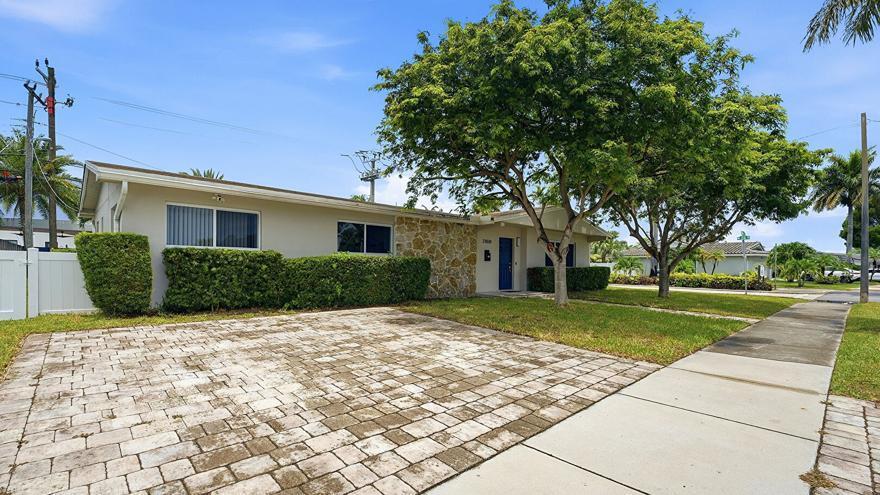 Welcome to this gorgeously renovated residence in the highly sought-after gated community of Highland Lakes, North Miami Beach. Updated with premium finishes throughout, this stunning ranch-style home offers an exceptional open-concept layout designed for luxurious living and effortless entertaining. The heart of the home is a massive chef's kitchen with a grand center island flowing seamlessly into an expansive living room. Elegant marble flooring and recessed lighting throughout create a sophisticated atmosphere with ample opportunity for personalization. Complete impact glass, dedicated laundry room, and fully fenced yard with a patio. Zoned for top-rated schools, included Krop Senior High, minutes from Aventura Mall, fine dining, houses of worship, and easy I-95 access. Move-in ready.